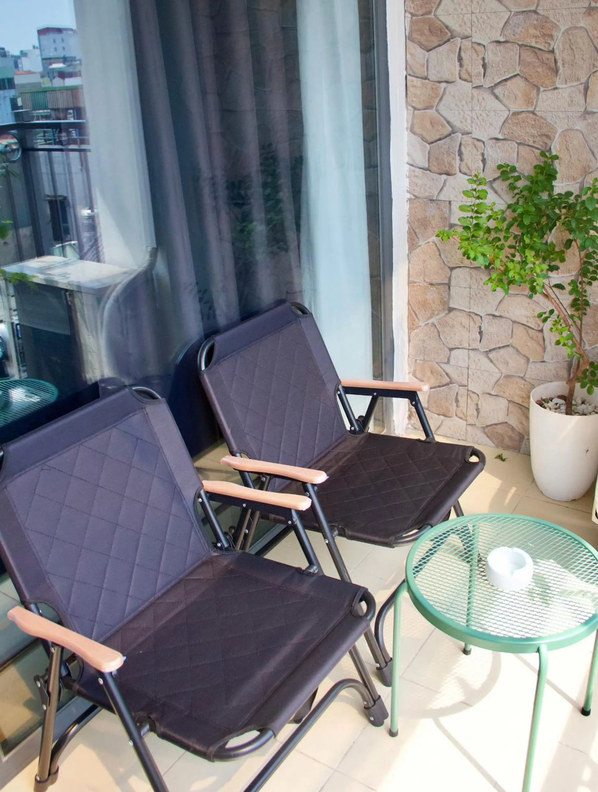 Family Room with Balcony in Hanoi Street Hotel