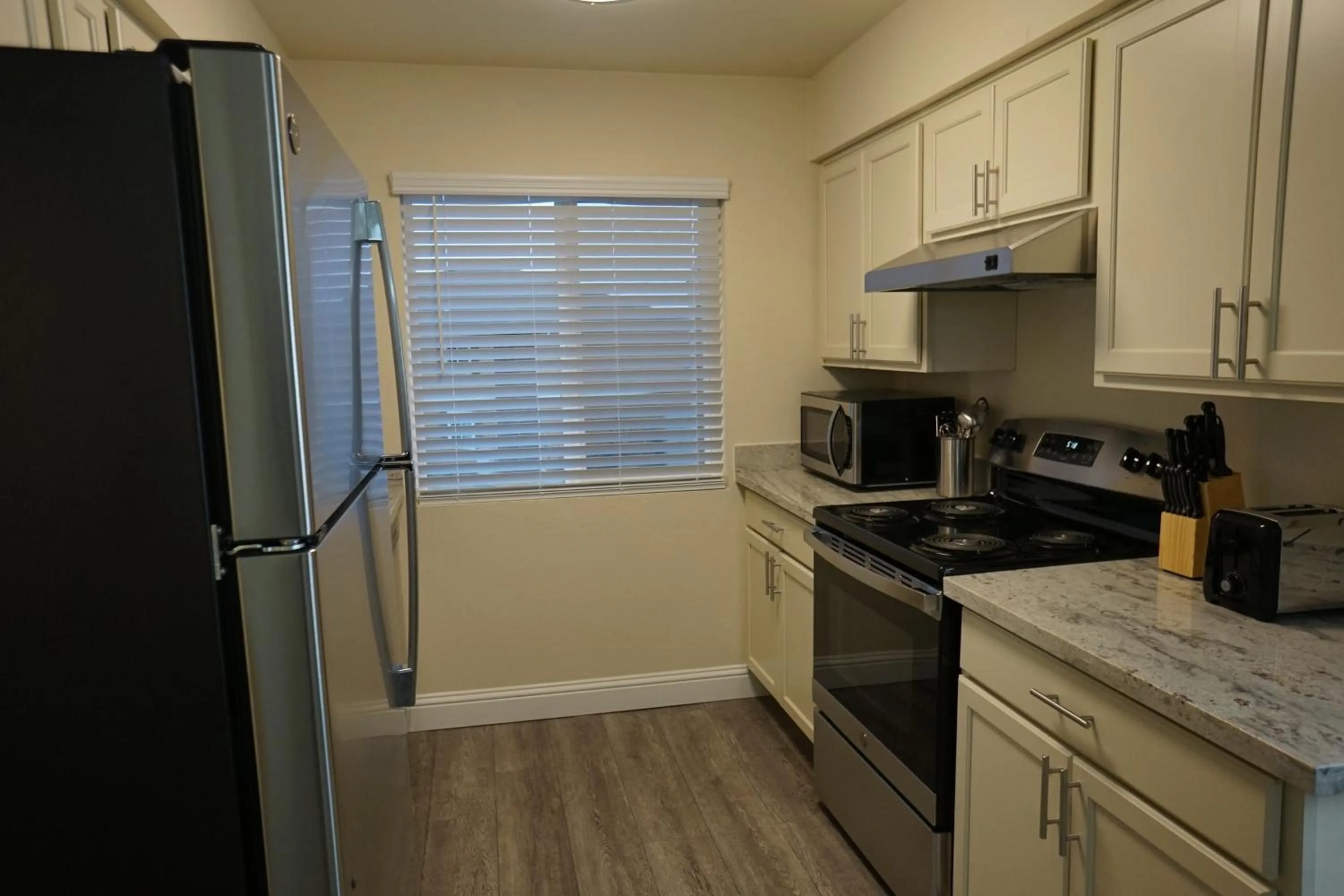 Kitchen or kitchenette in Sleepover 1BD 1BA Oklahoma City Apartments