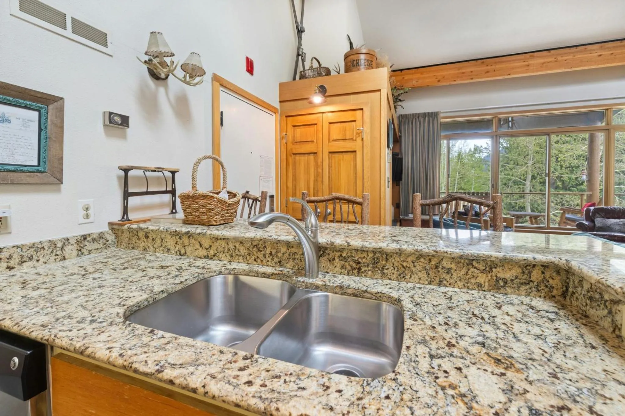 Communal kitchen in Evergreen Condominiums by Vail Resorts