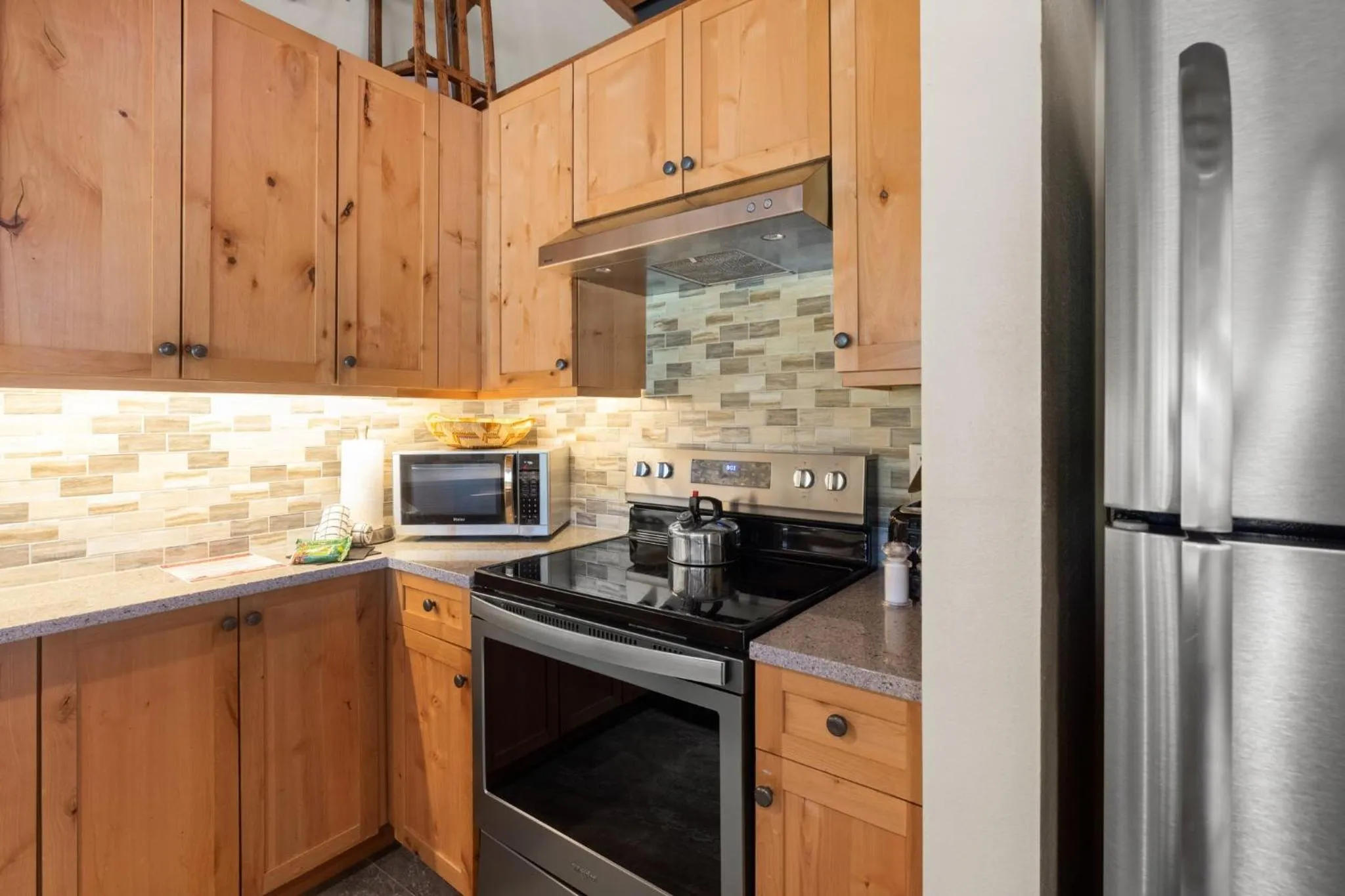 Communal kitchen in Evergreen Condominiums by Keystone Resort
