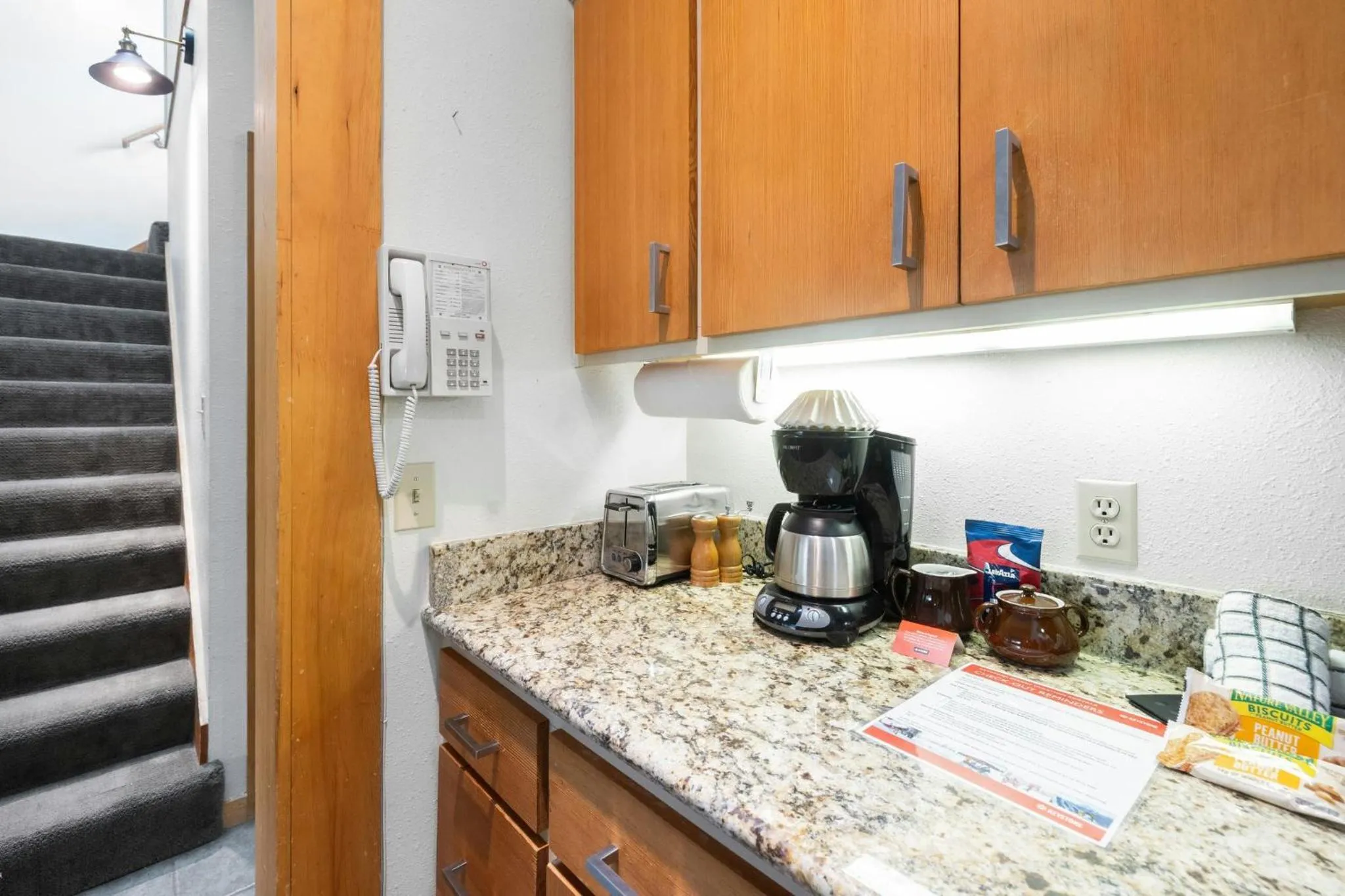 Communal kitchen in Evergreen Condominiums by Vail Resorts