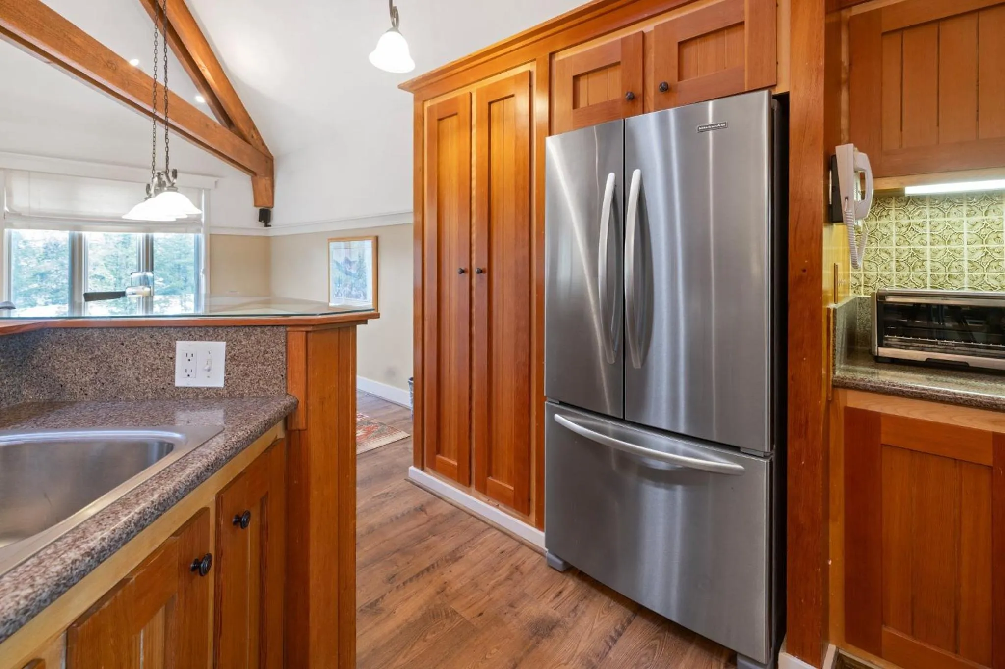 Communal kitchen in Forest Condominiums by Vail Resorts