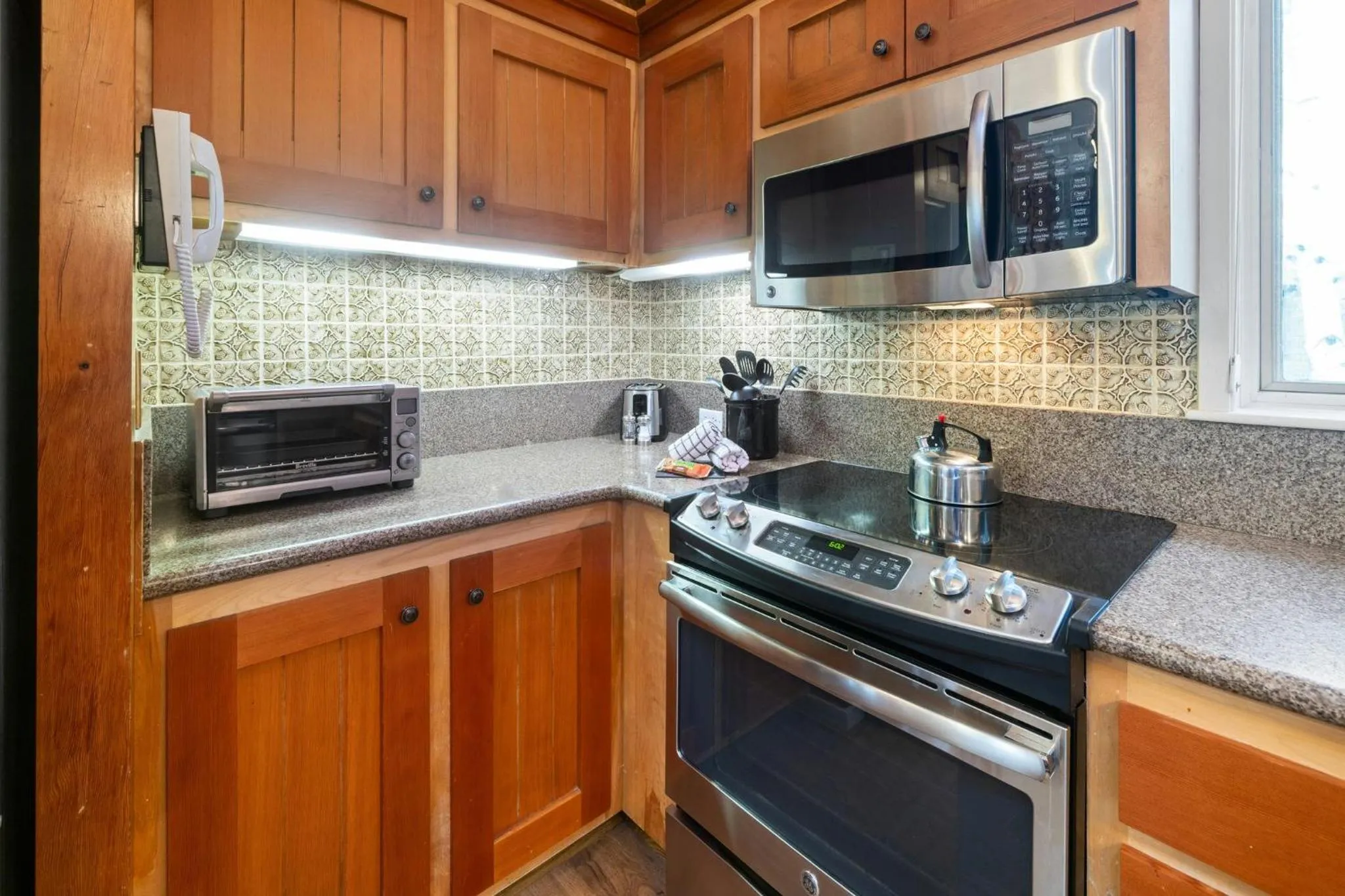 Communal kitchen in Forest Condominiums by Vail Resorts