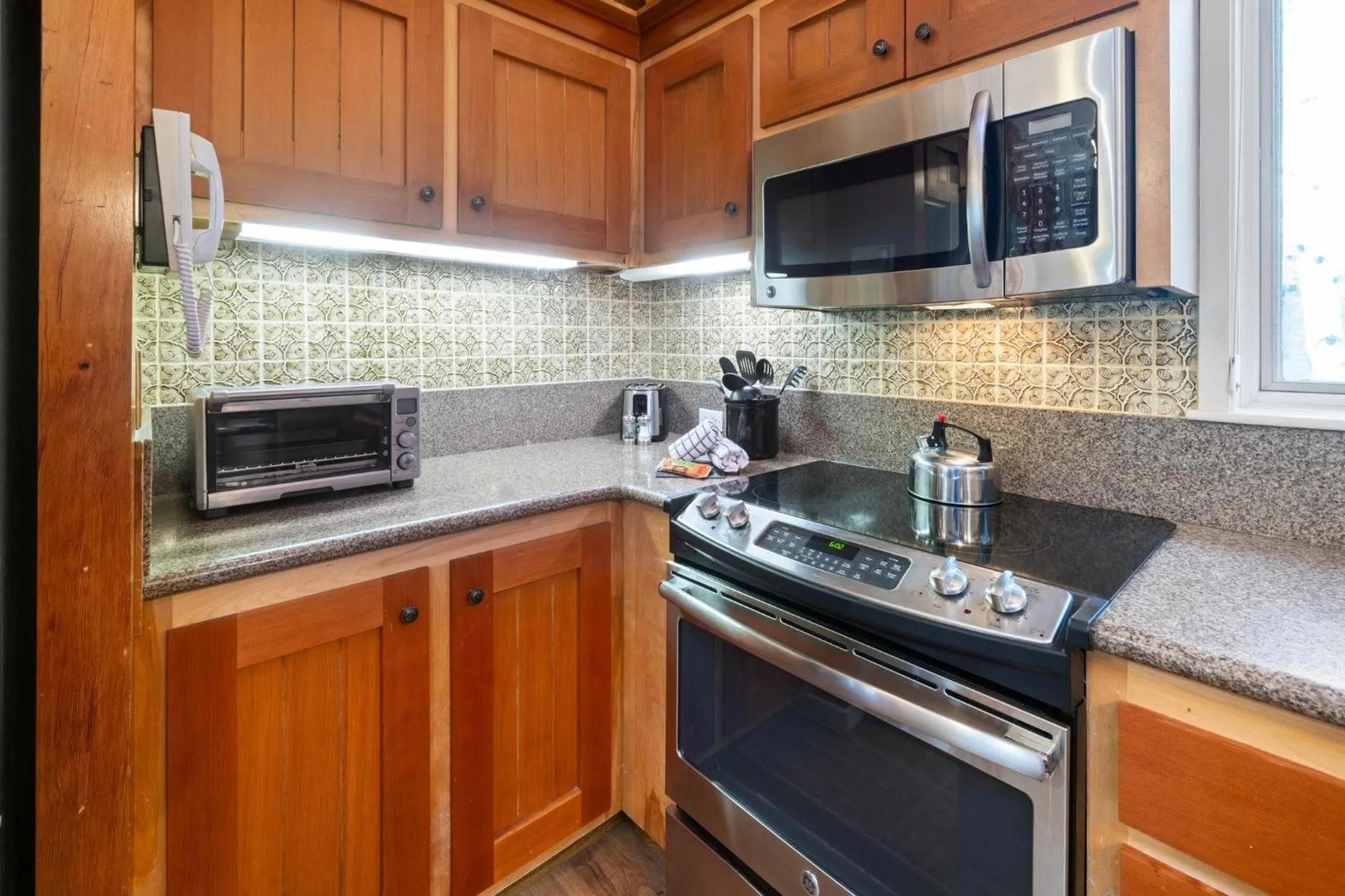 Communal kitchen in Forest Condominiums by Vail Resorts