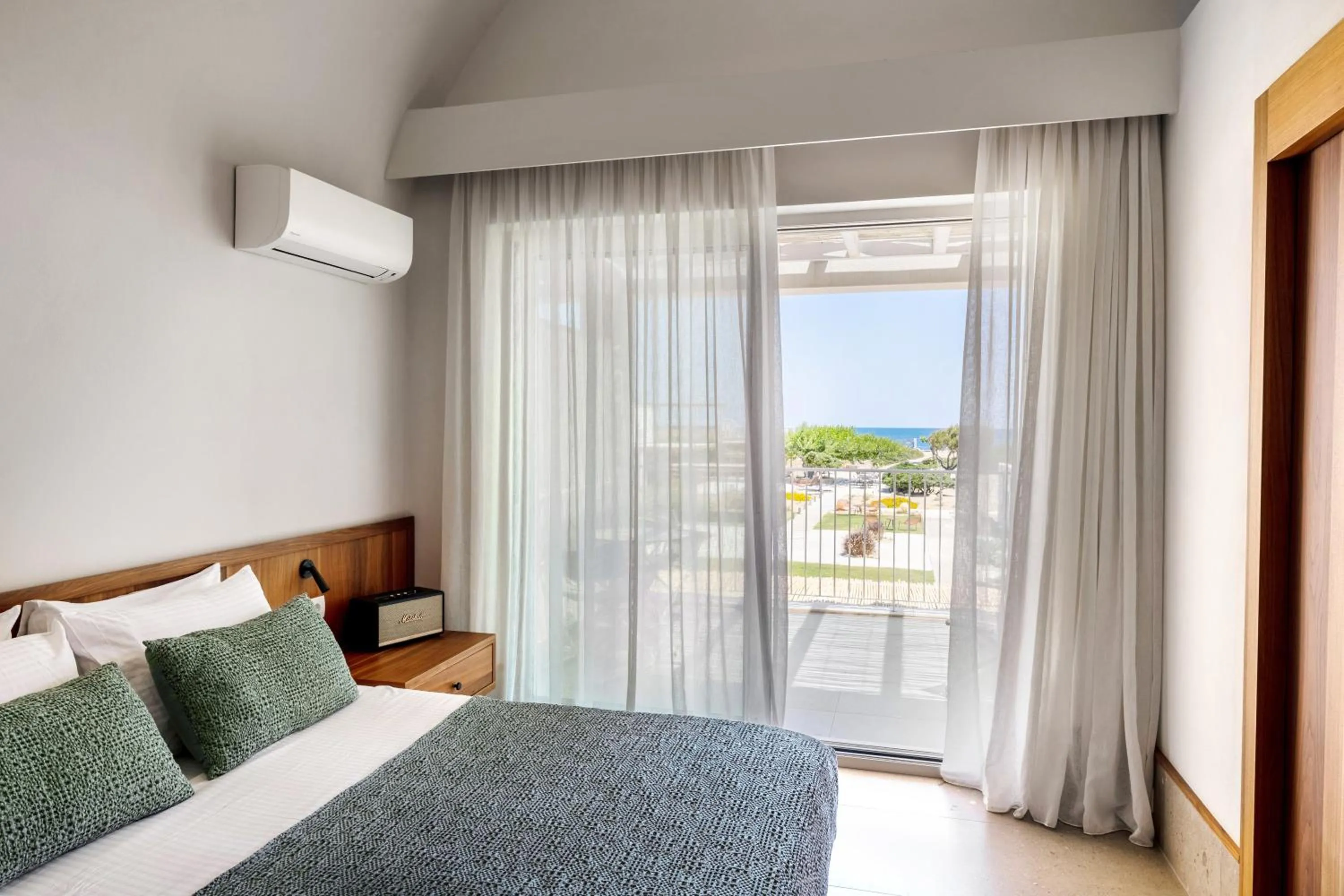 View (from property/room), Bed in ALERÓ Seaside Skyros Resort