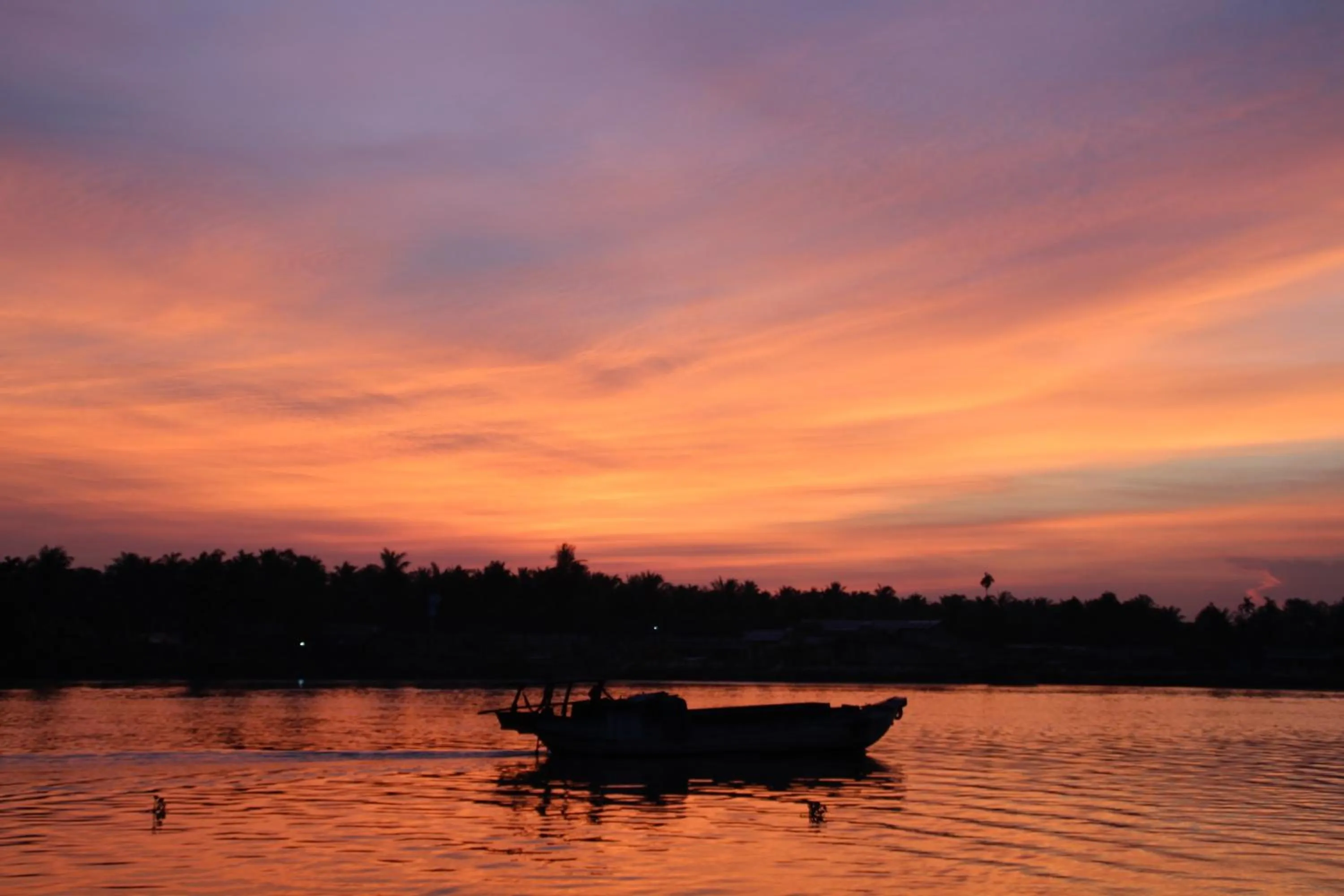 Sunset in Mango Home Riverside Eco - Resort