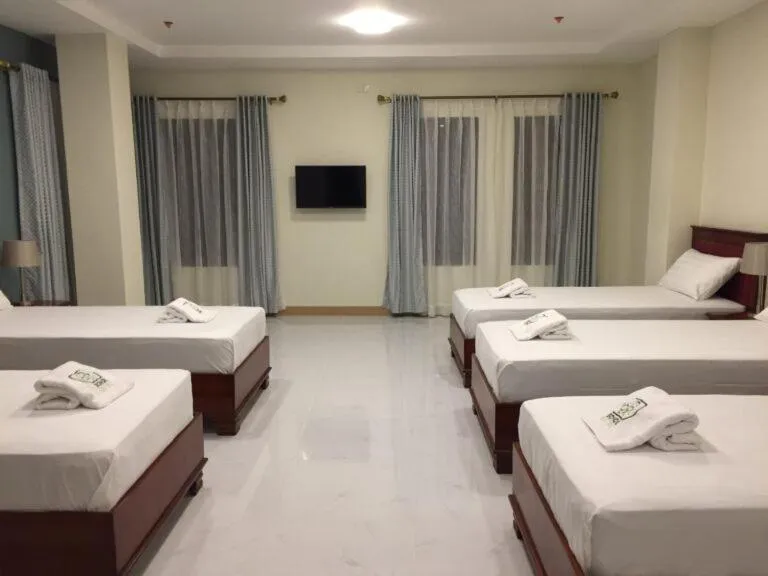 Photo of the whole room, Bed in Bohol Ecotel