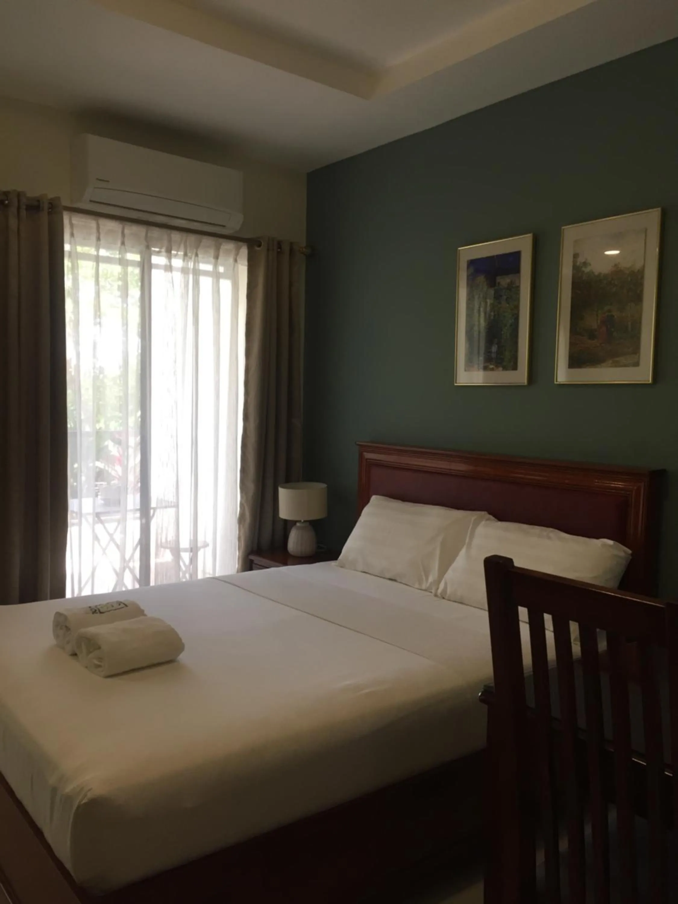 Photo of the whole room, Bed in Bohol Ecotel