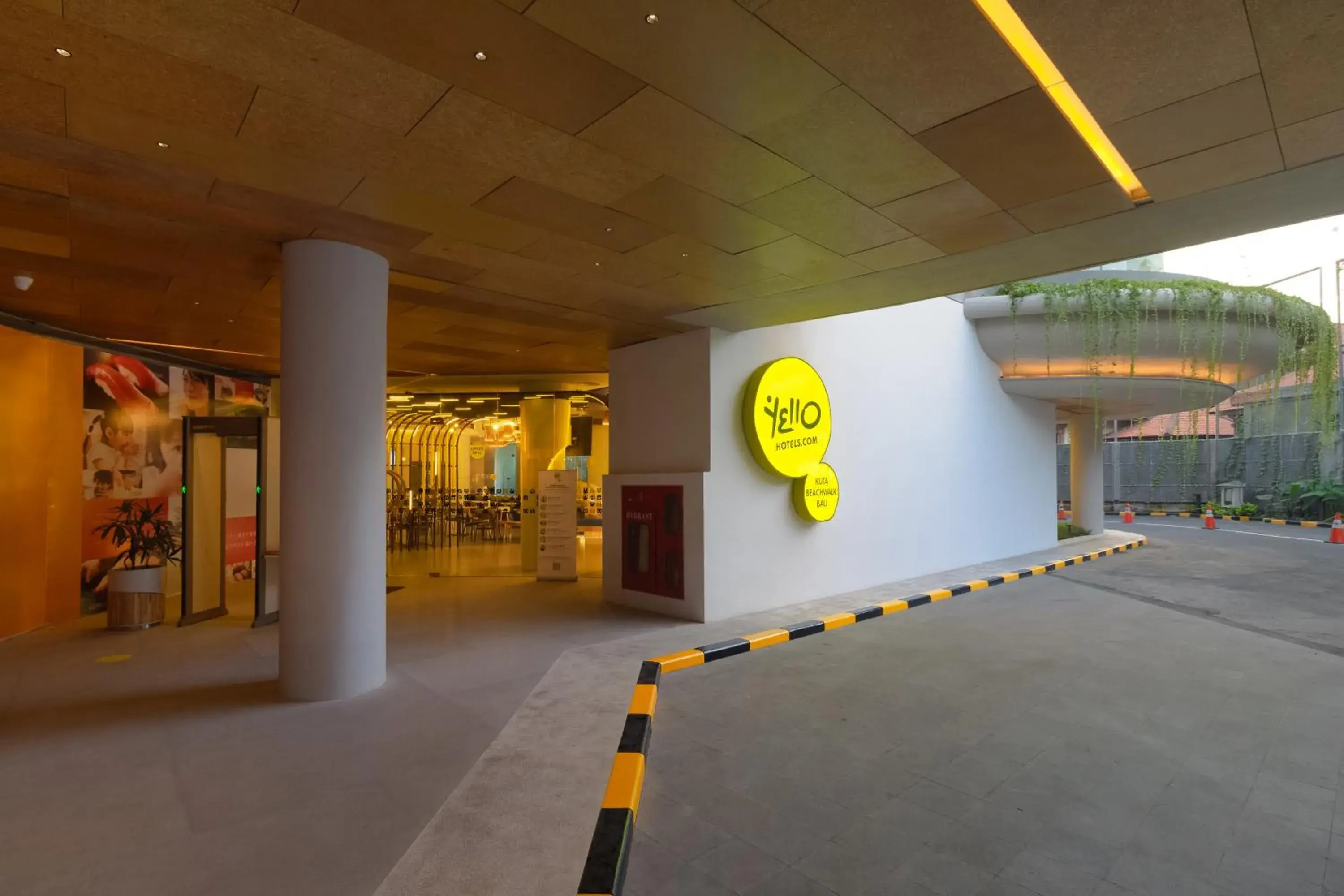 Facade/entrance in YELLO Hotel Kuta Beachwalk Bali Facade/entrance in YELLO Hotel Kuta Beachwalk Bali