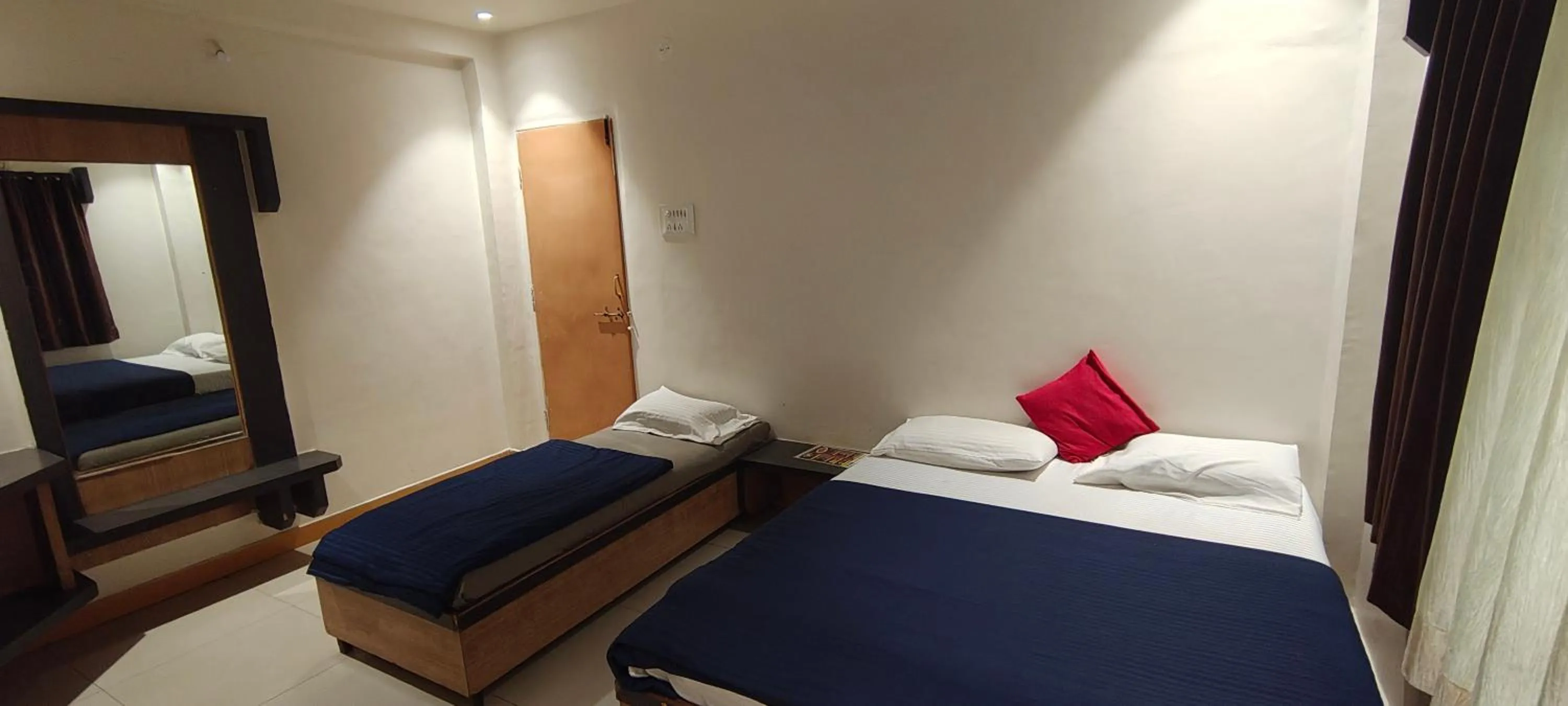 Bed in Blueberry Budget Hotel