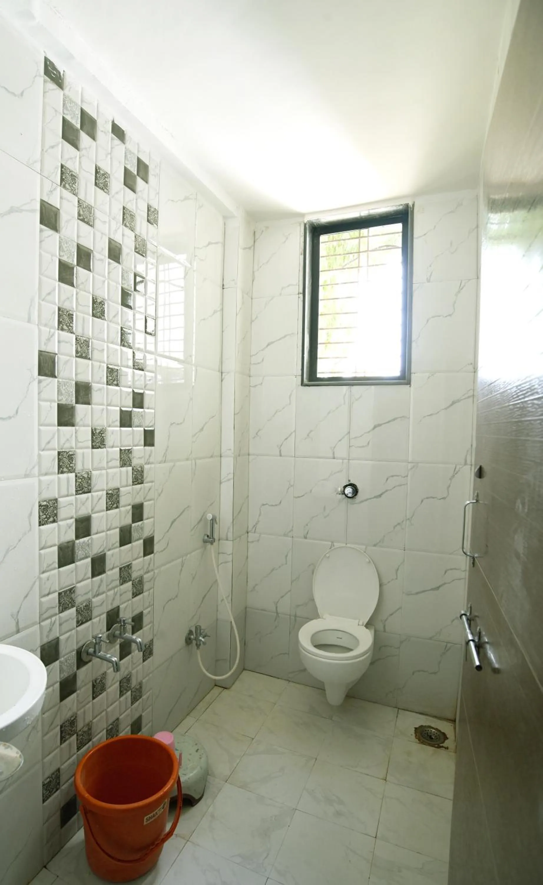 Toilet in Blueberry Budget Hotel