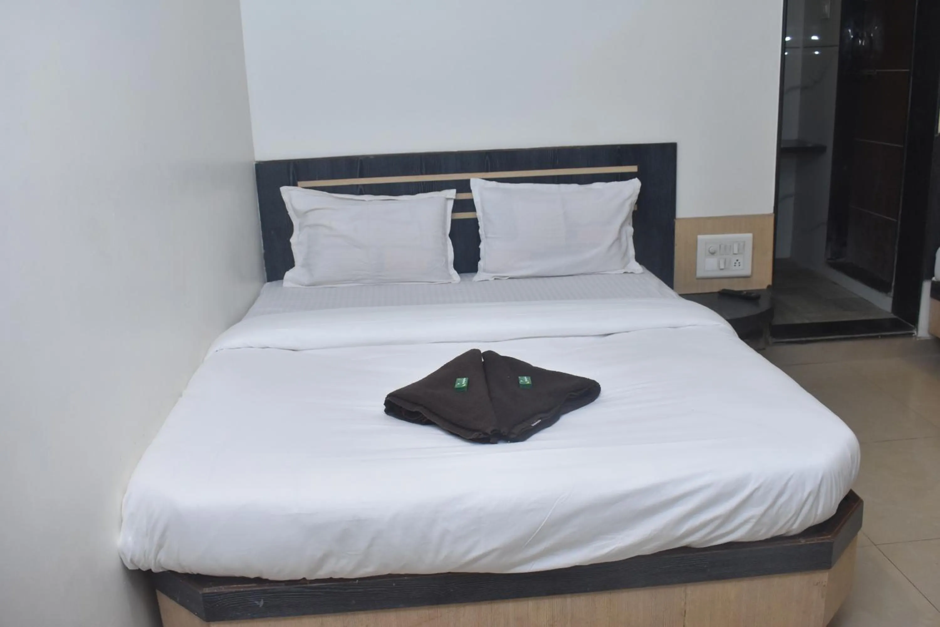Bed in Blueberry Budget Hotel