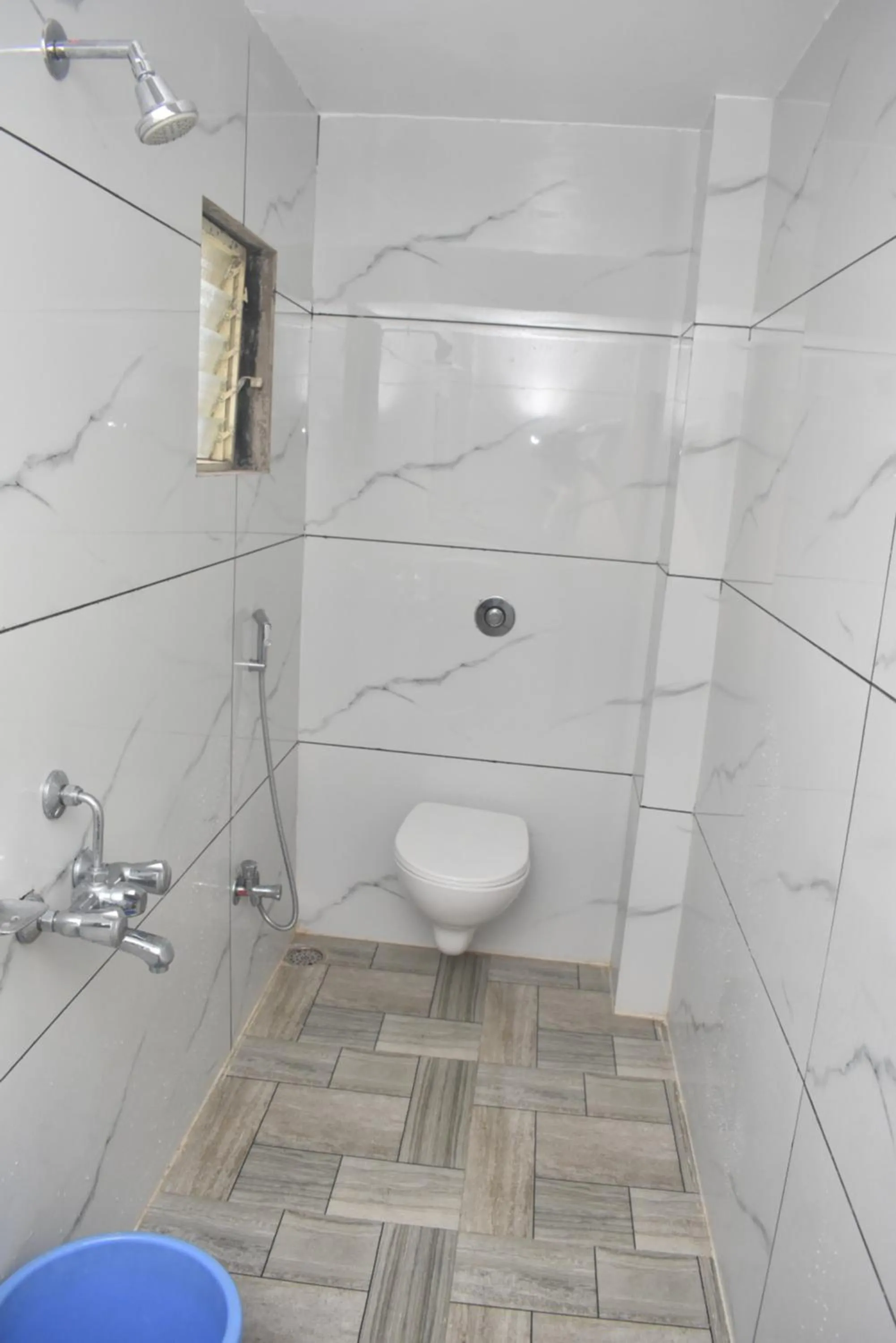 Toilet in Blueberry Budget Hotel