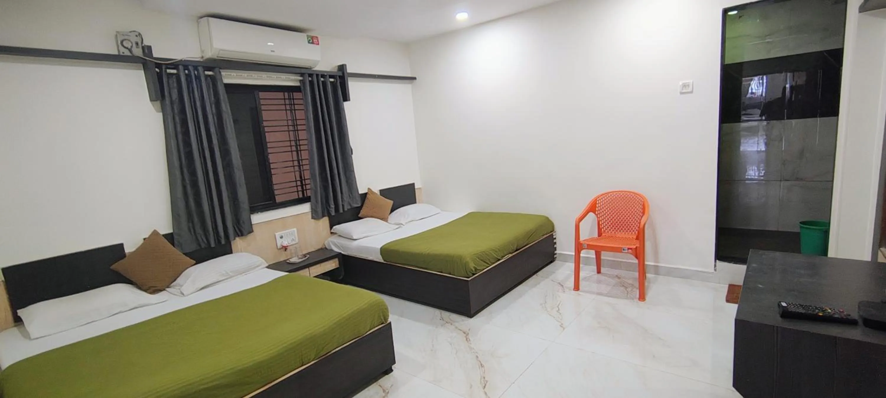 Bed in Blueberry Budget Hotel