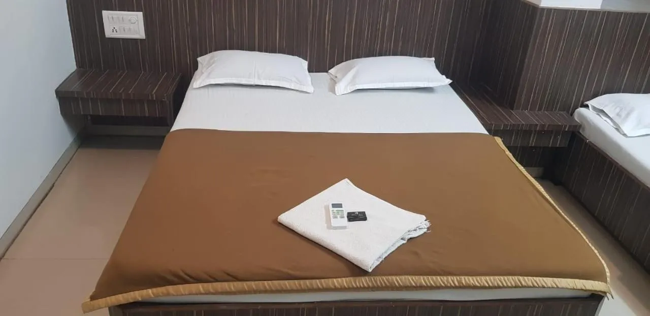 Bed in Blueberry Budget Hotel