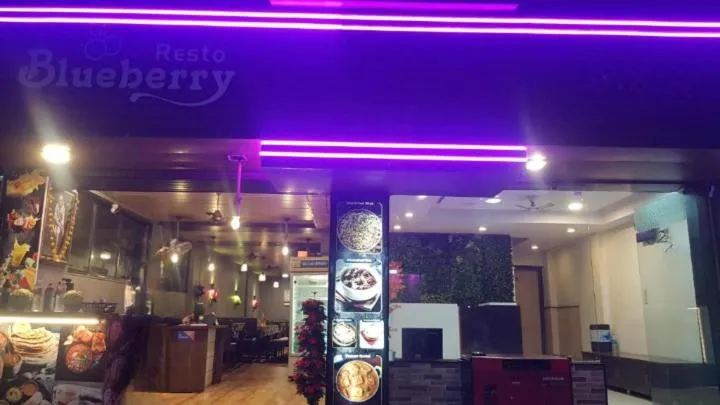 Property logo or sign in Blueberry Budget Hotel