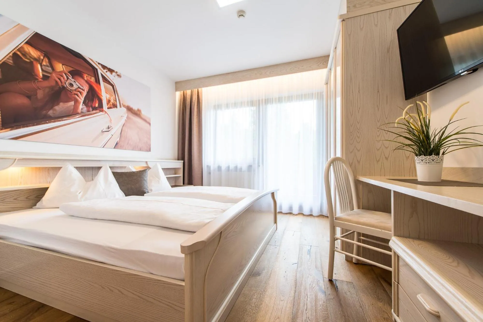 Bed in Hotel Sigmunderhof