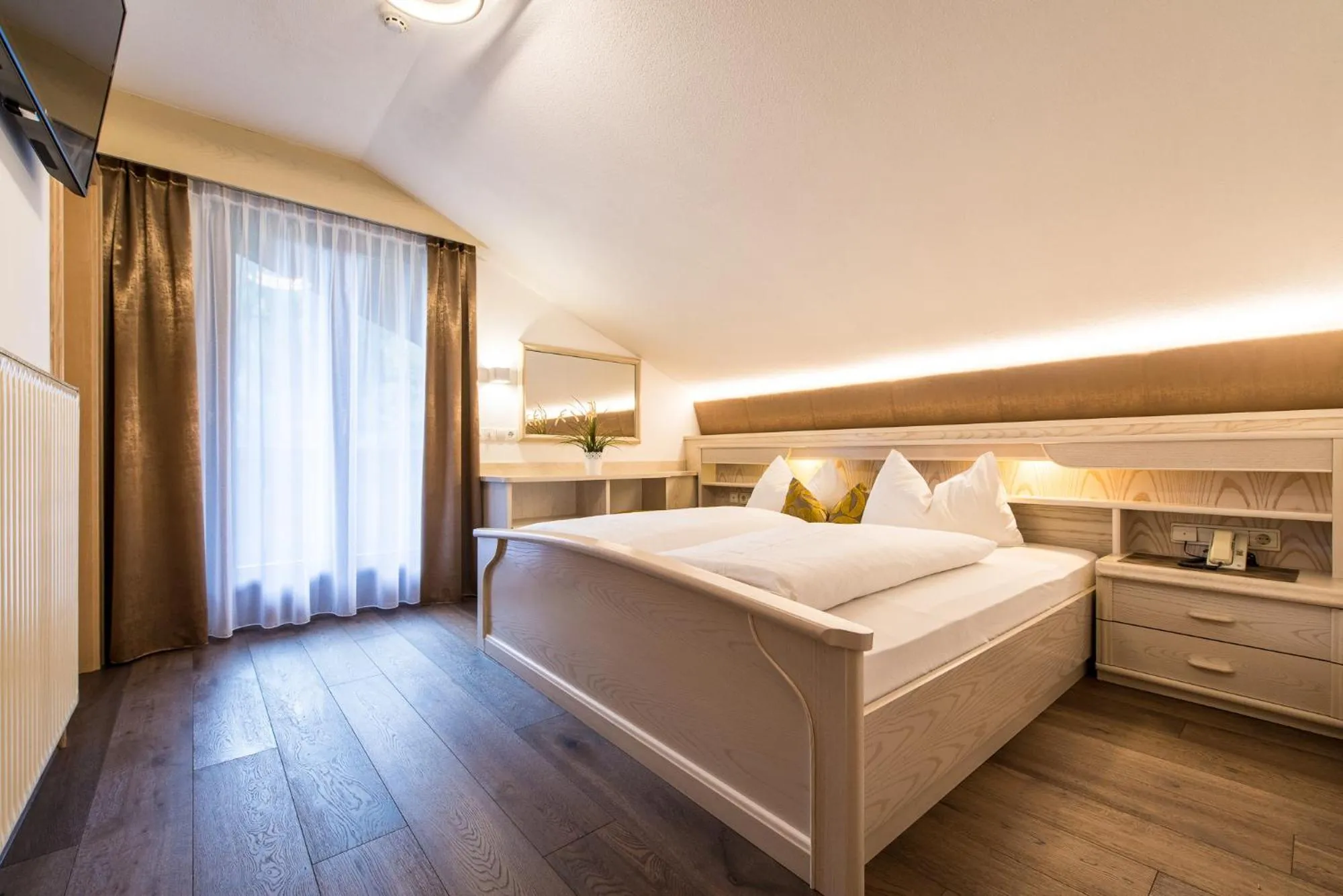 Bed in Hotel Sigmunderhof