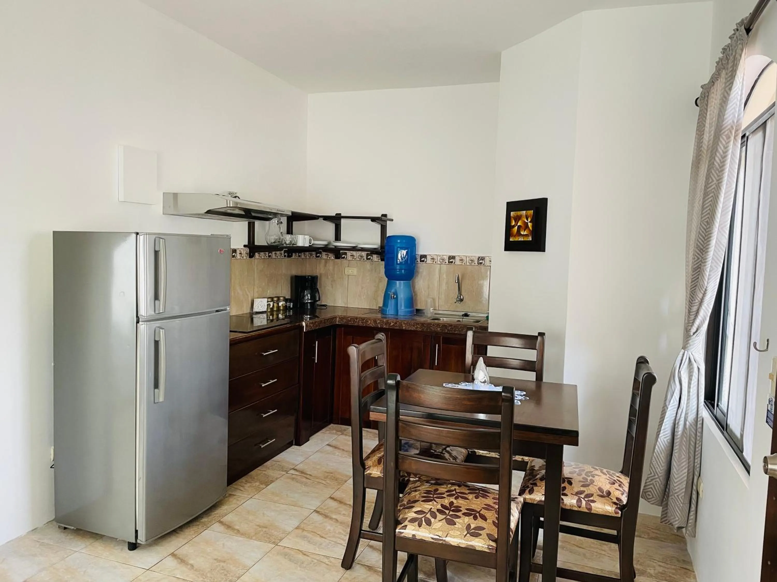 Kitchen or kitchenette in Apartahotel Casa Soleil