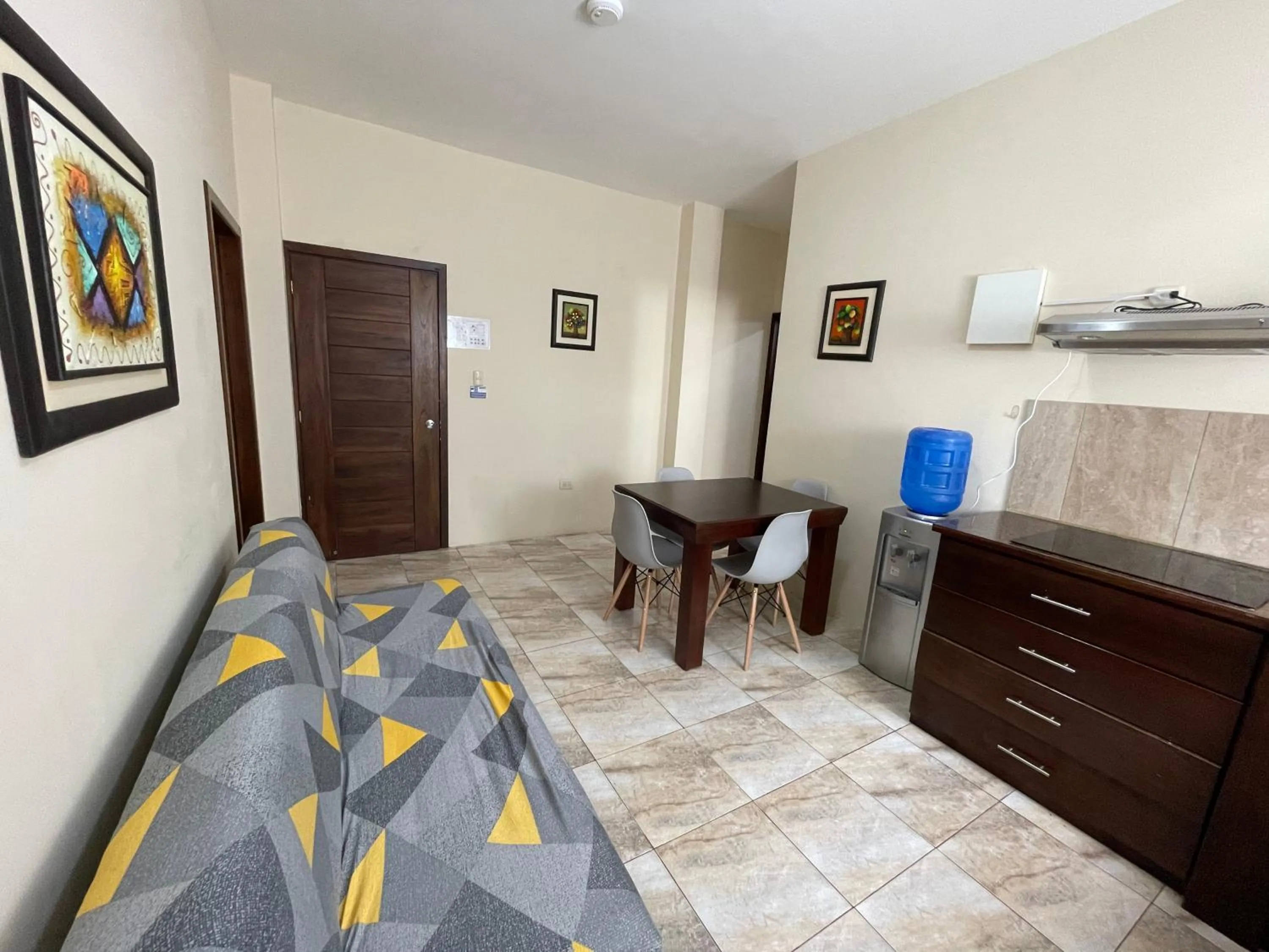 Kitchen or kitchenette, Bed in Apartahotel Casa Soleil