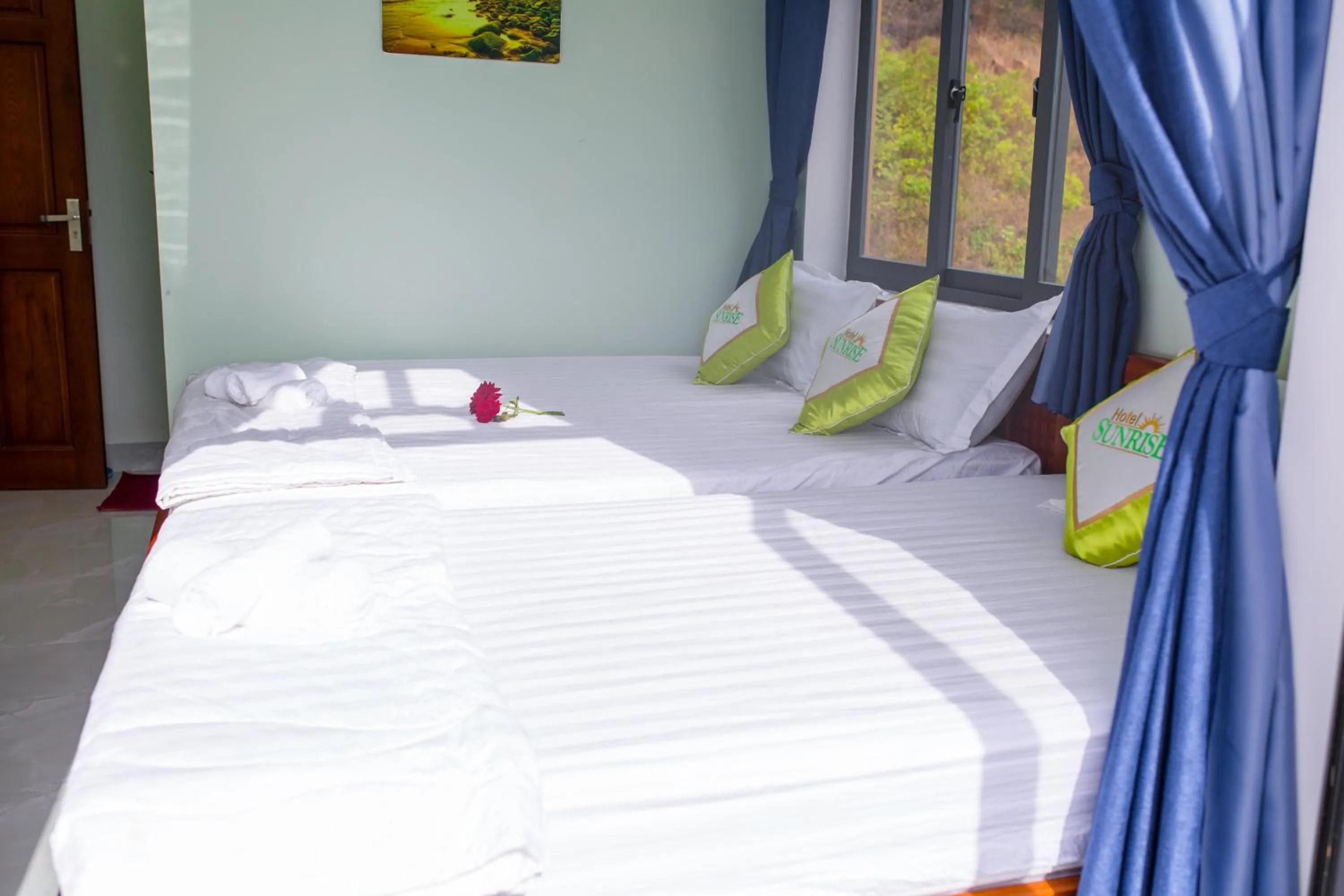 Bedroom, Bed in SUNRISE HOTEL