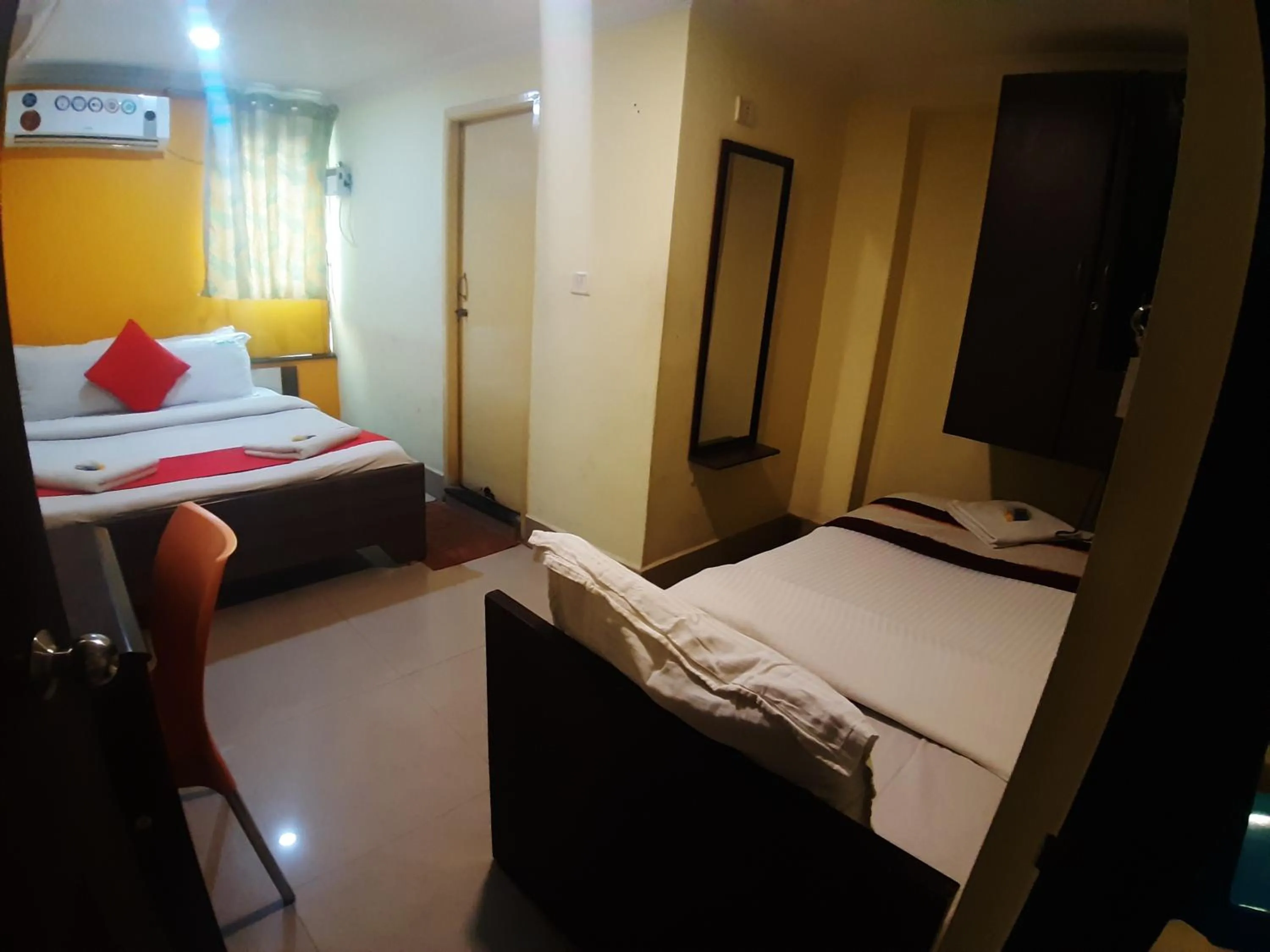 Bed in Hotel Akash inn