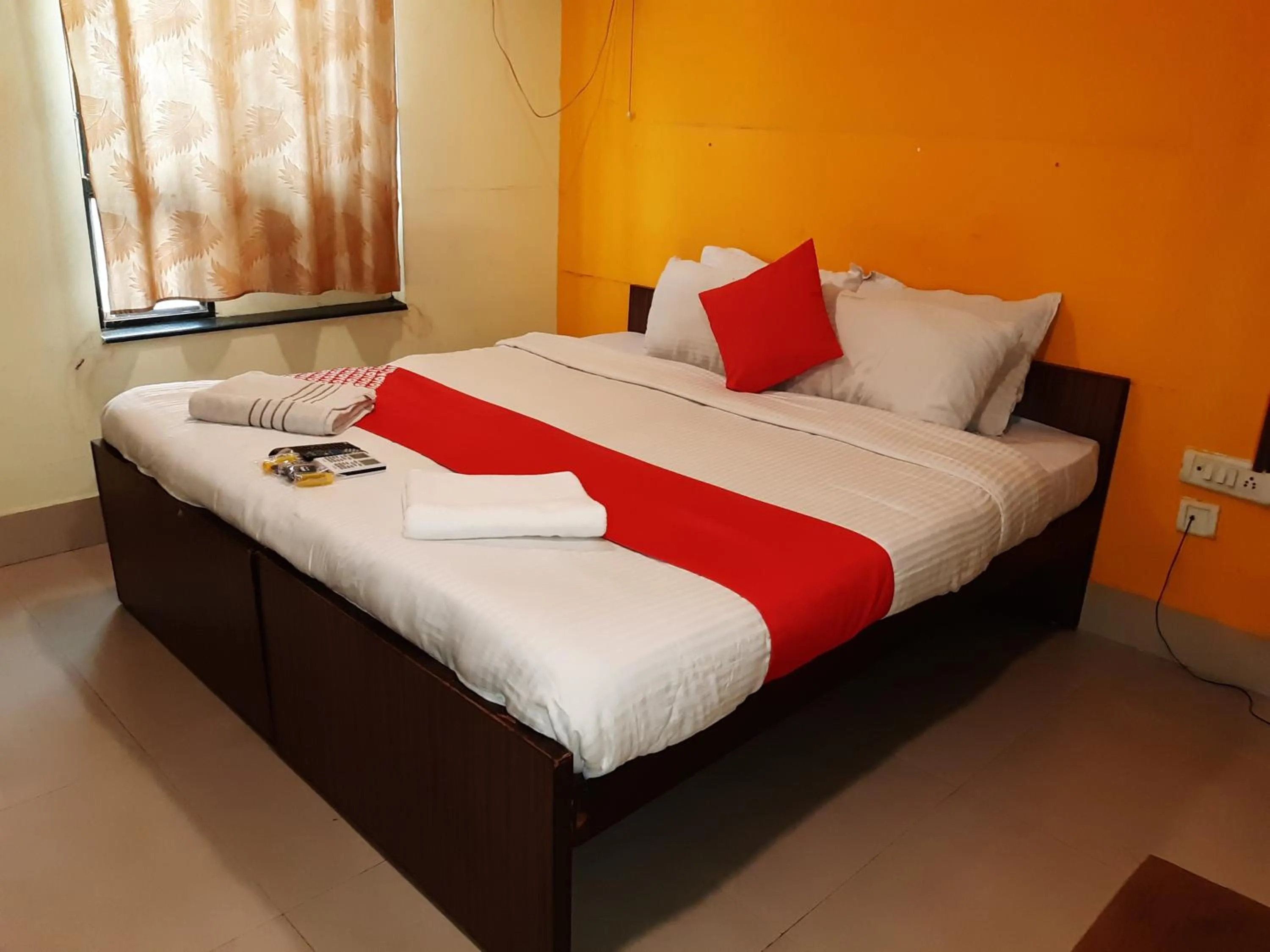 Bed in Hotel Akash inn