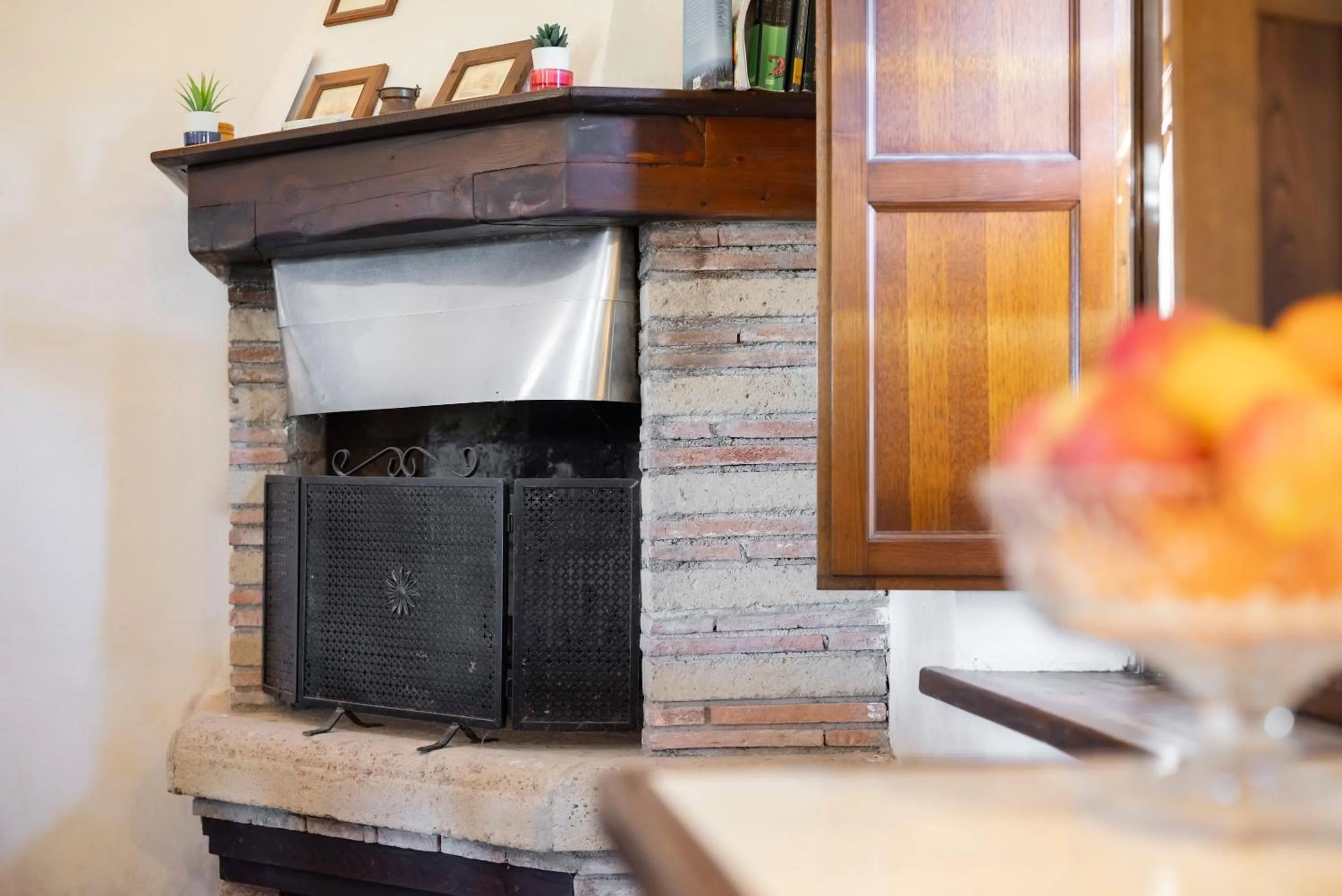 fireplace in Relais Il Ciliegio