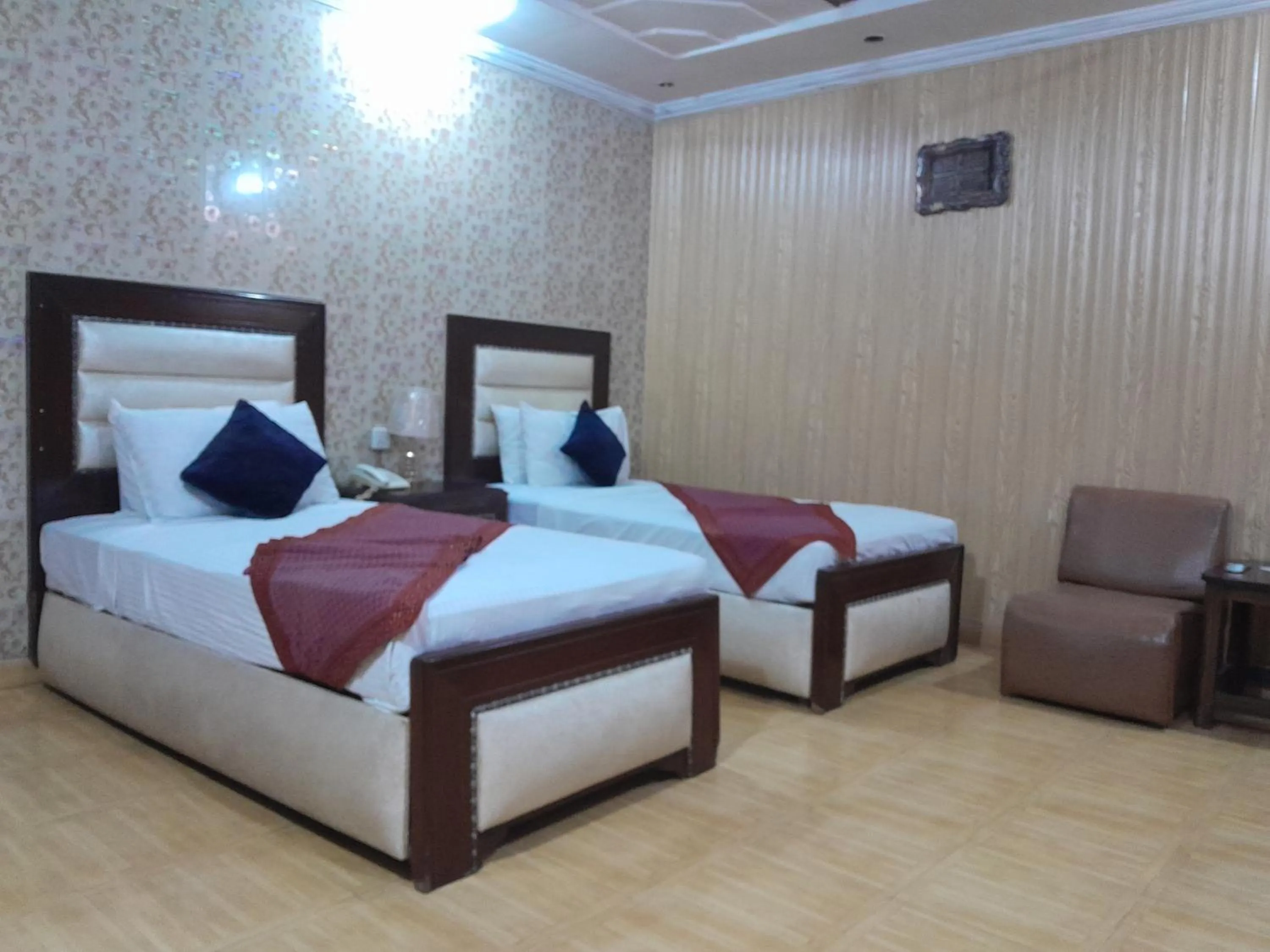 Bed in Hotel Tulip INN Faisal Town
