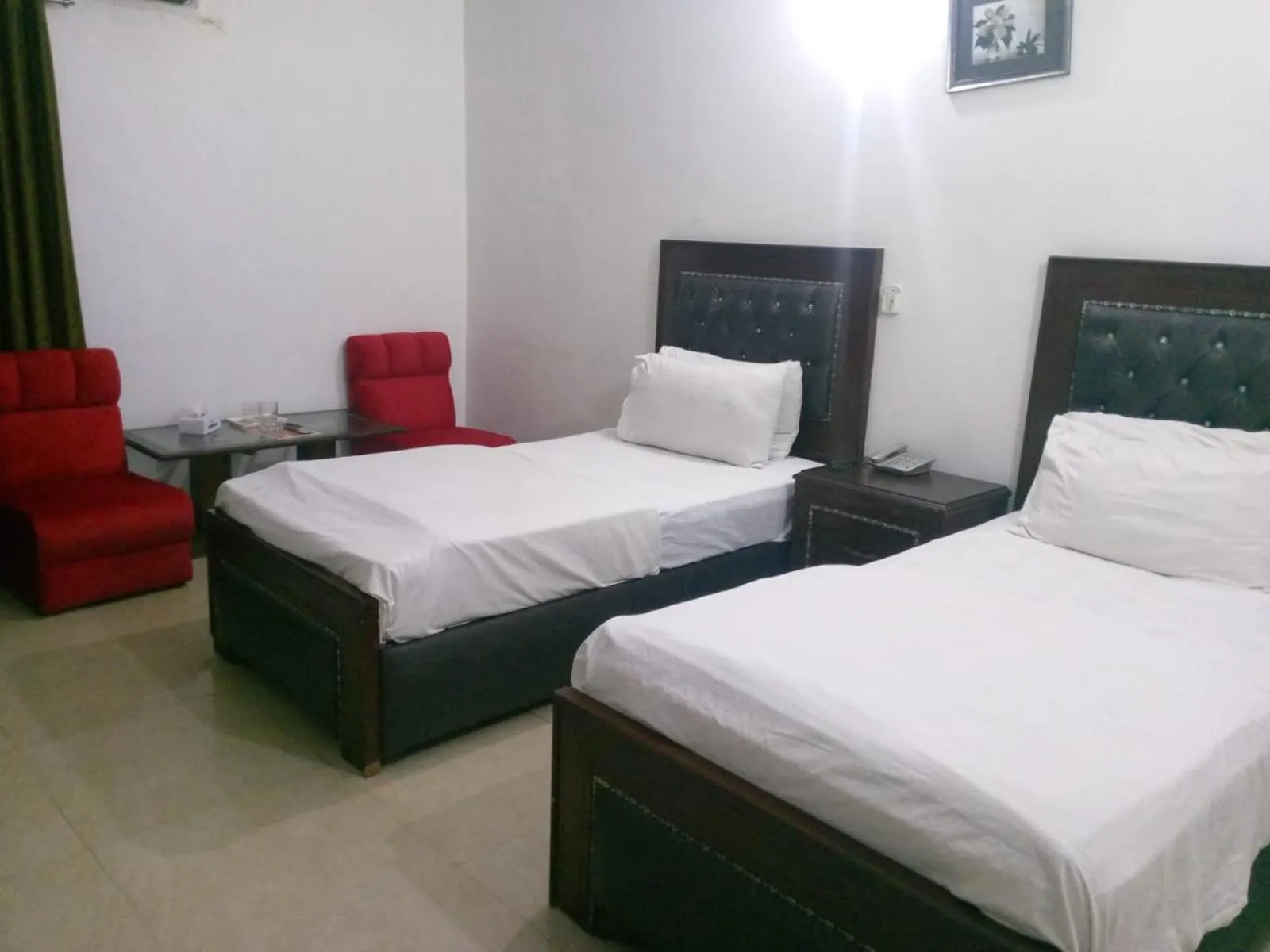 Bed in Hotel Tulip INN Faisal Town