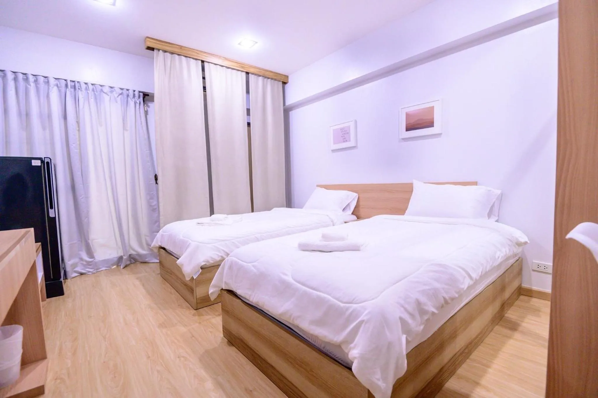 Bed in Creston Grand Hotel Suphan Buri