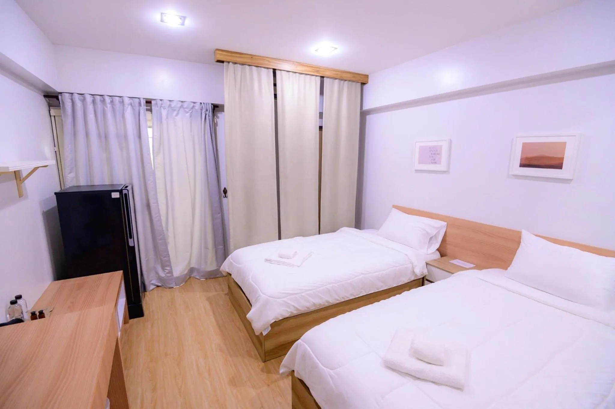 Bed in Creston Grand Hotel Suphan Buri