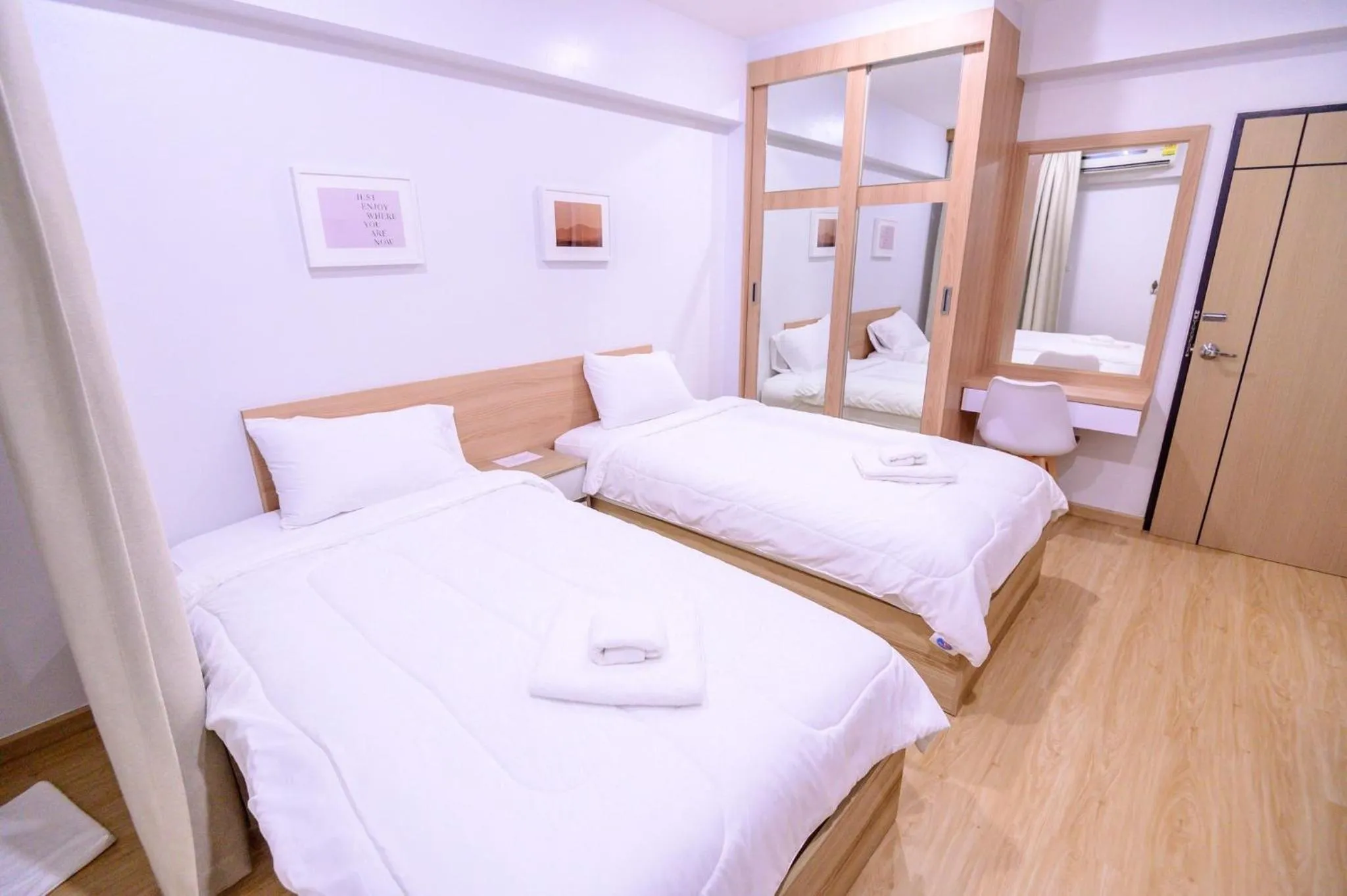 Bed in Creston Grand Hotel Suphan Buri