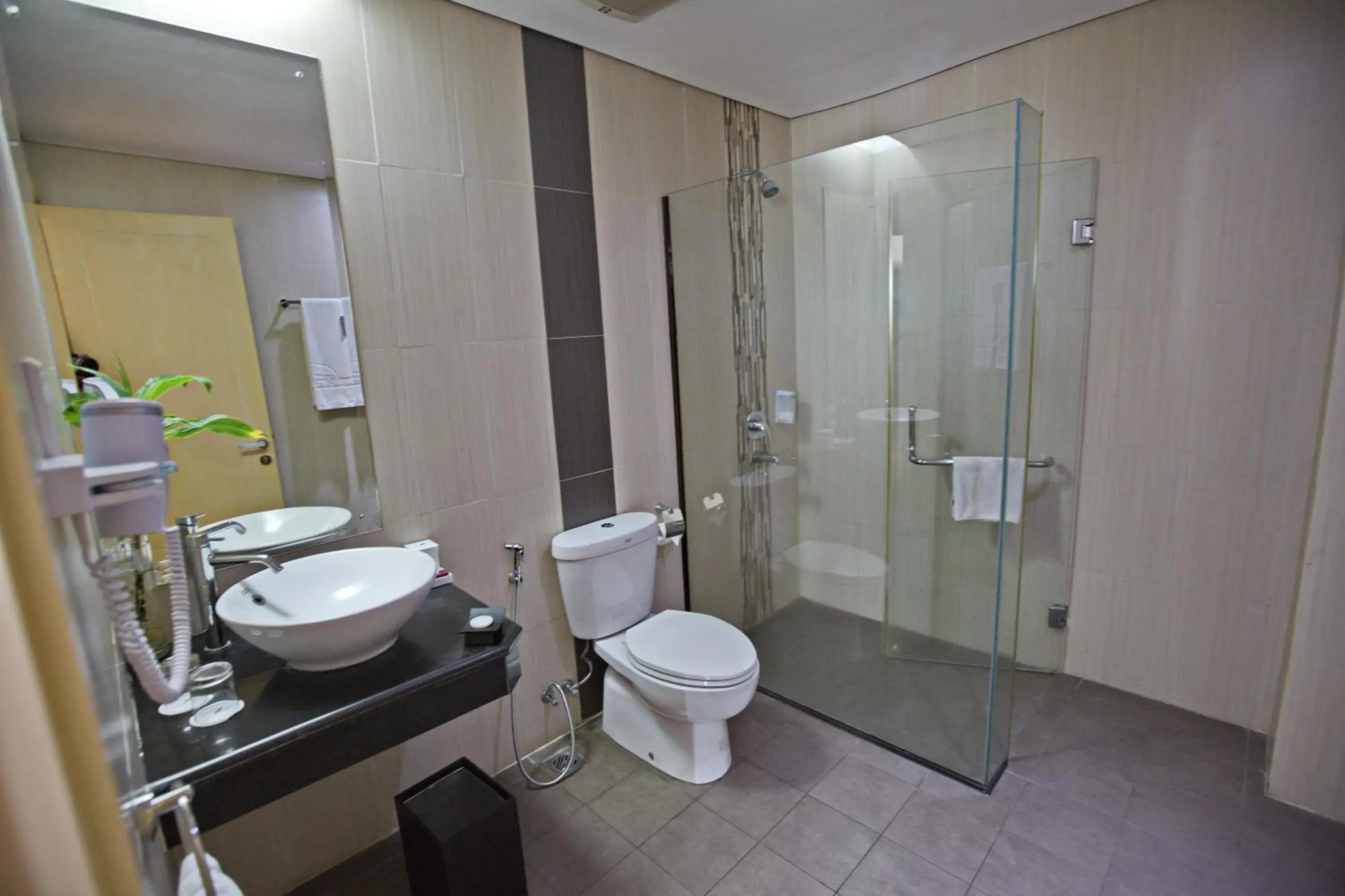 Bathroom in Padjadjaran Suites Resort and Convention Hotel Bathroom in Padjadjaran Suites Resort and Convention Hotel