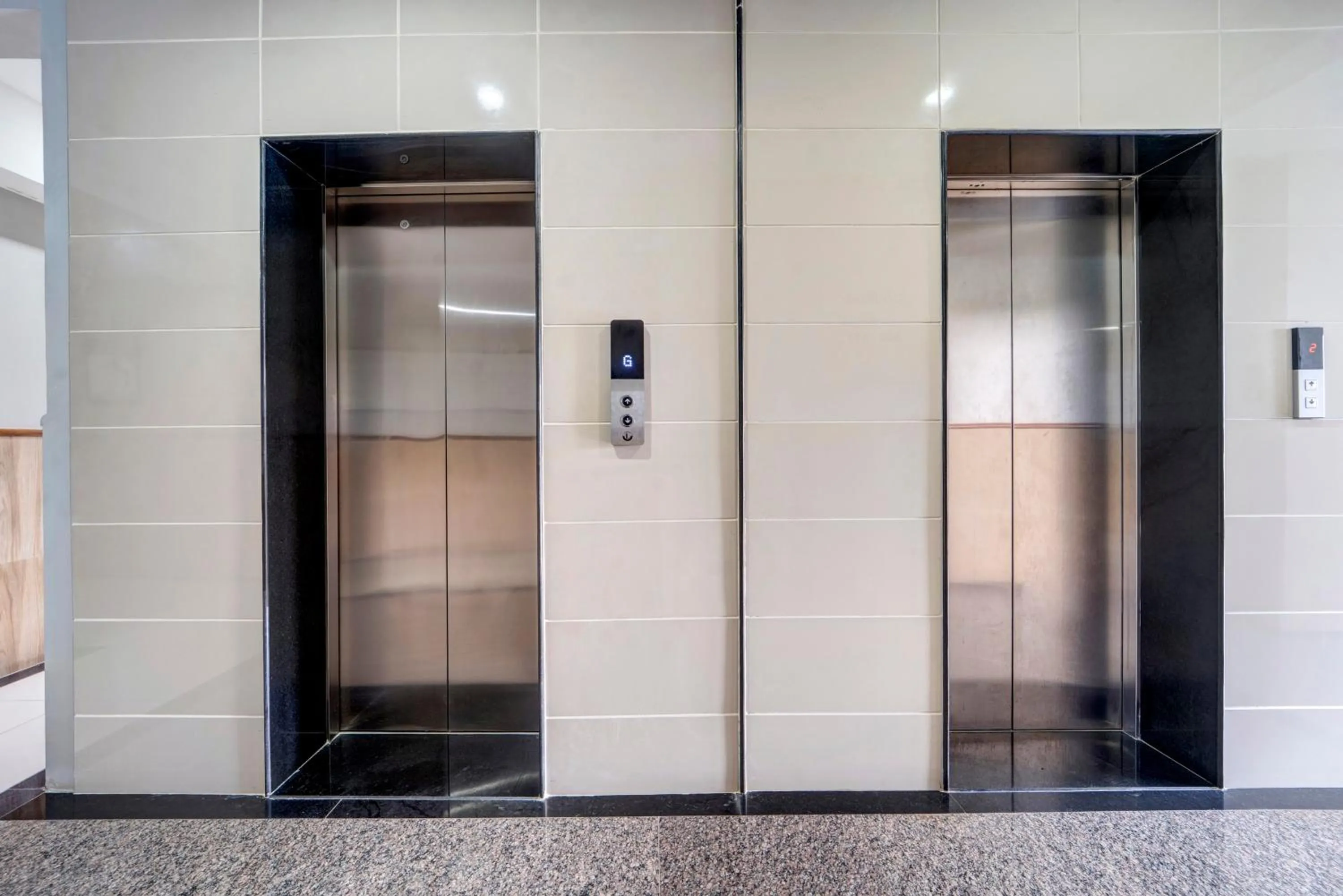 elevator in Treebo Pratham Inn, Manipal