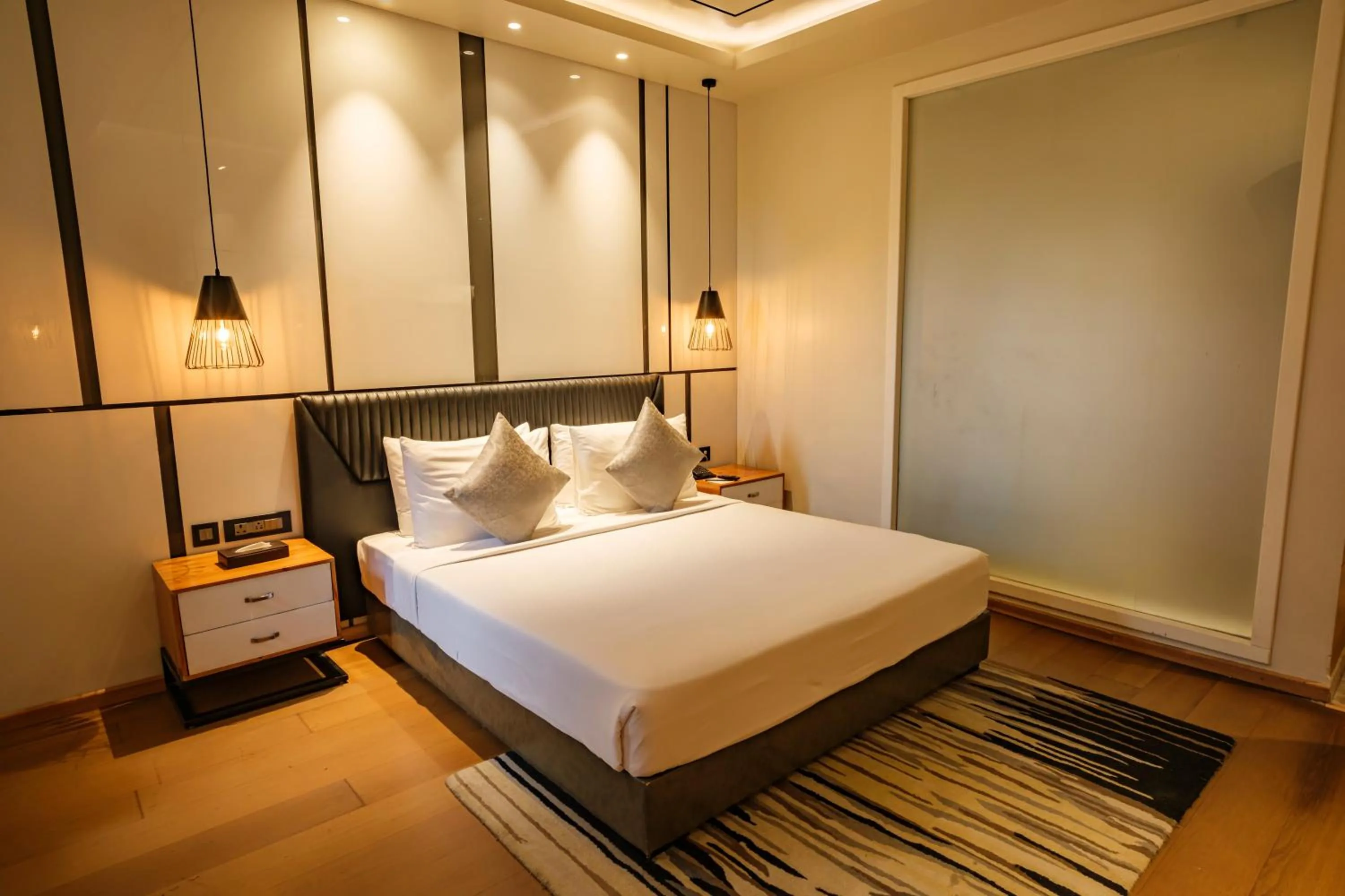 Bed in Udman Hotel Greater Noida