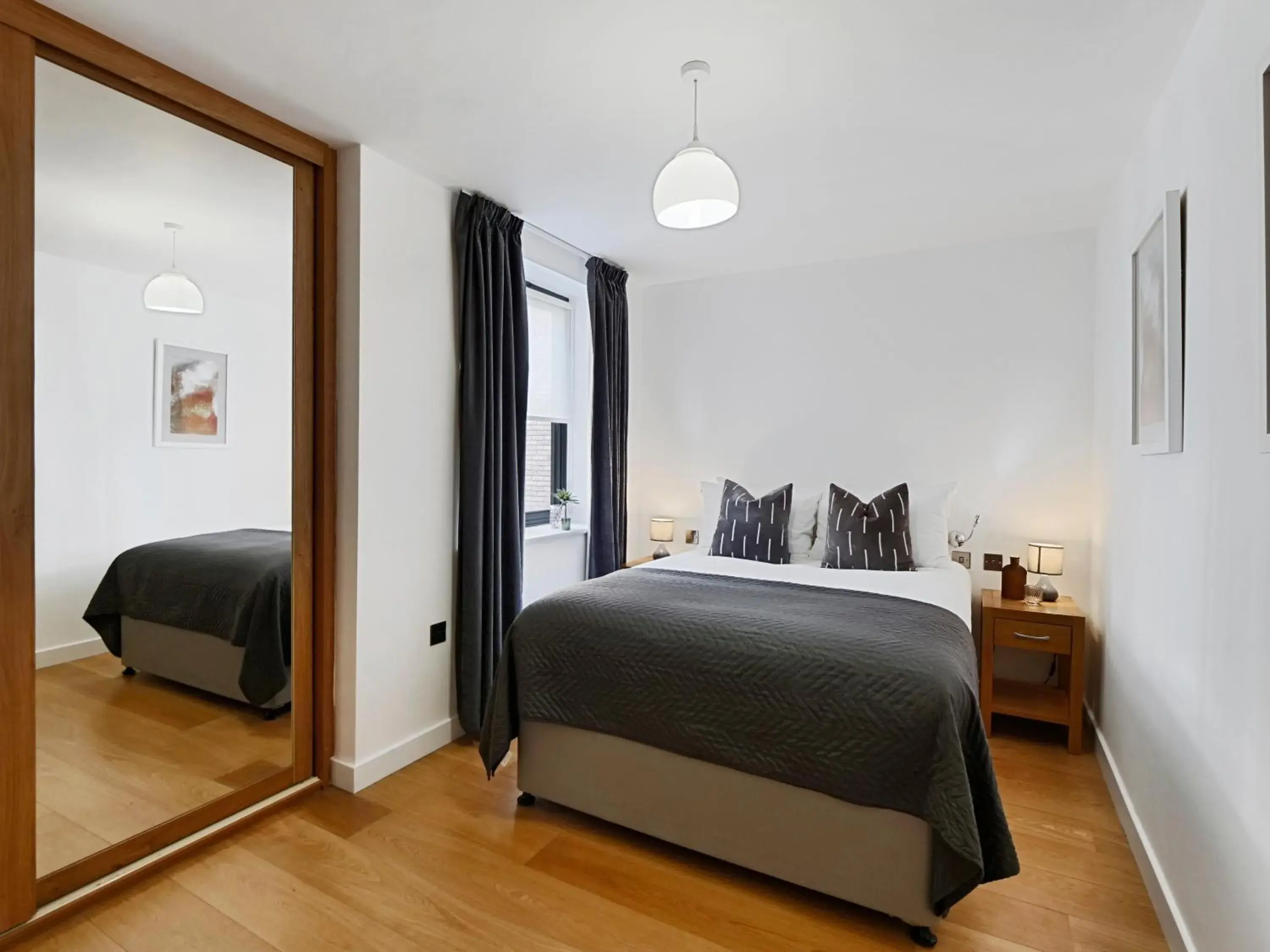 Bed in Cambric by Aeria Apartments Bed in Cambric by Aeria Apartments