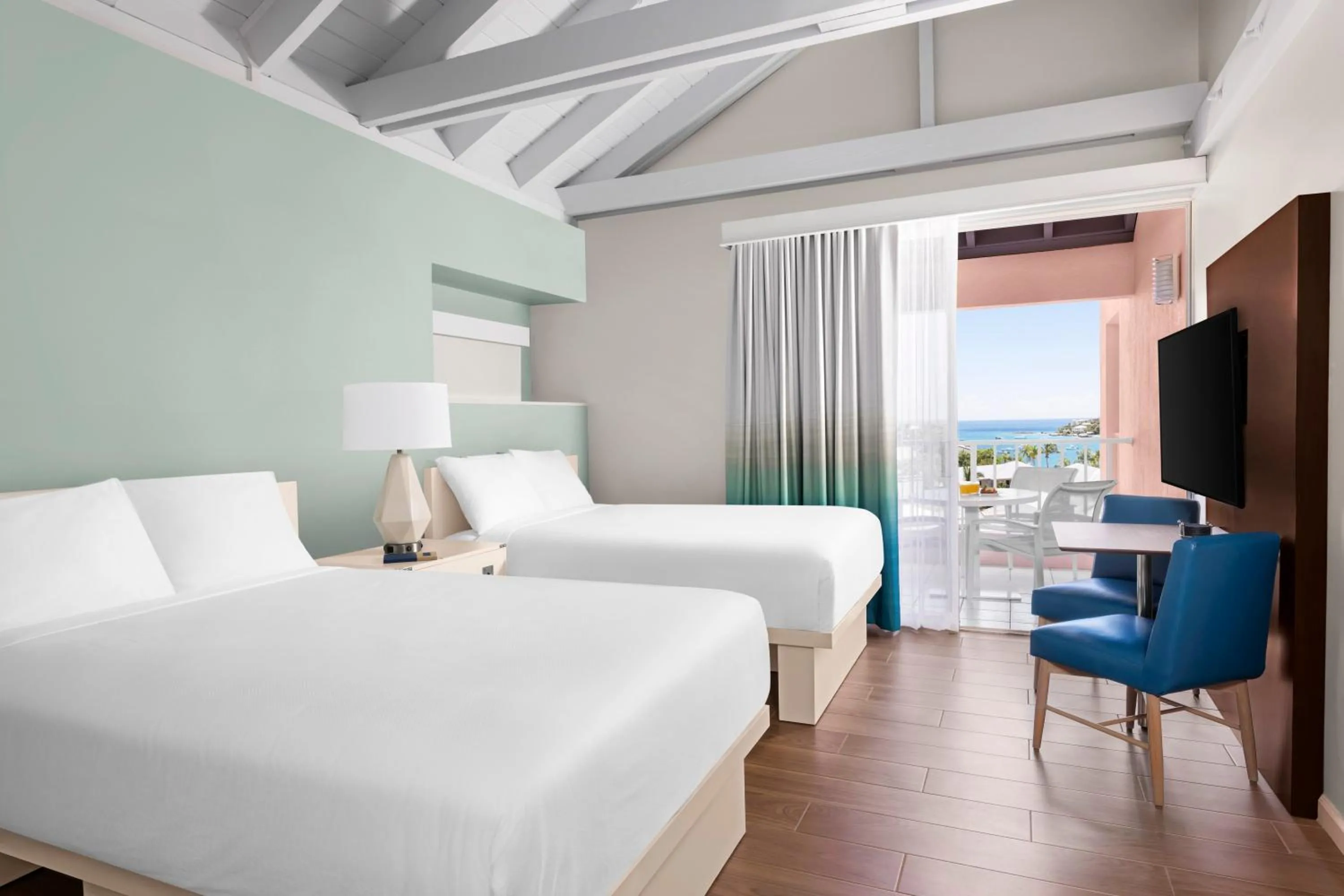 Photo of the whole room, Bed in Elysian Beach Resort
