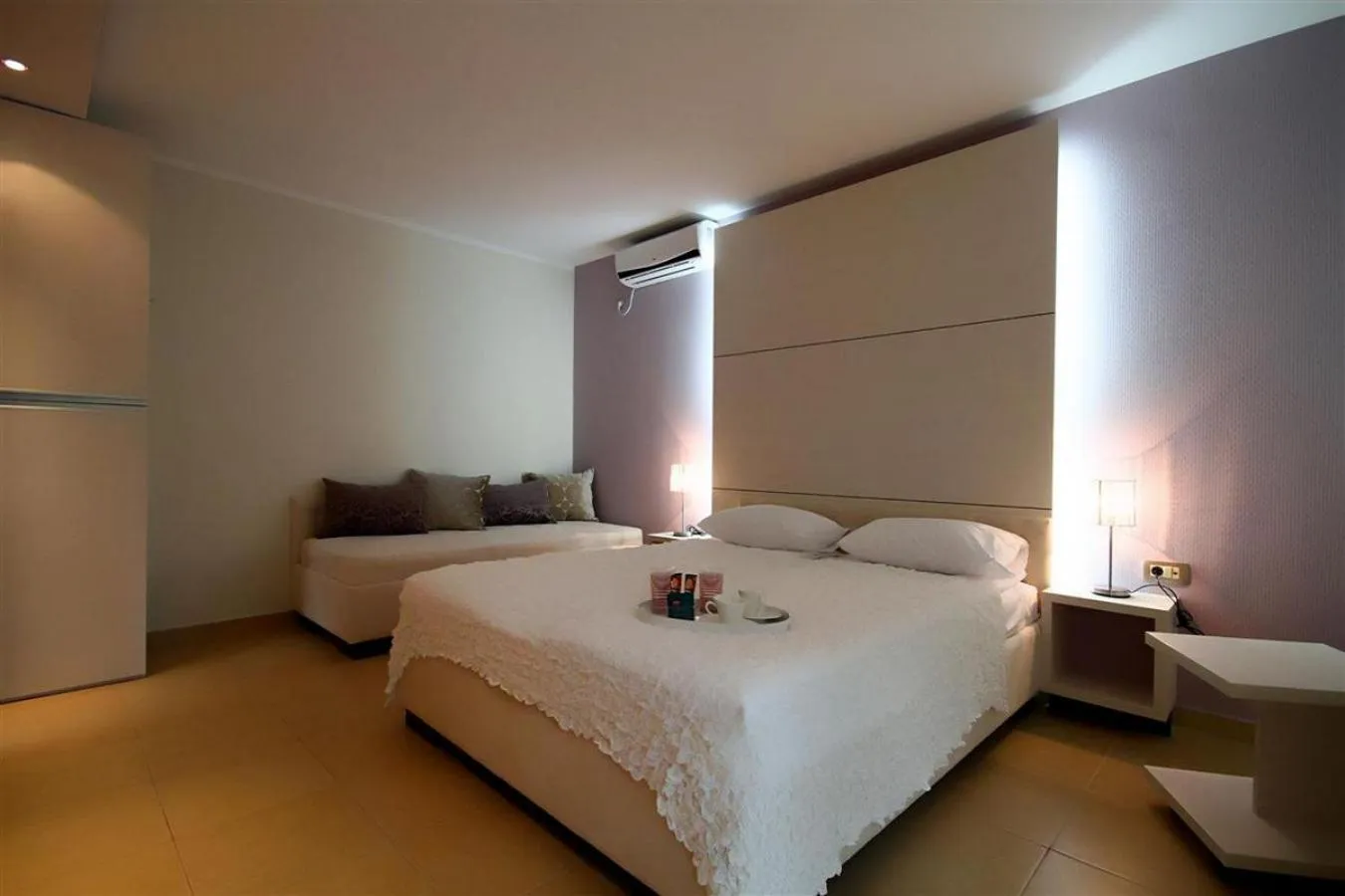 Bed in Domador Rooms & Apartments