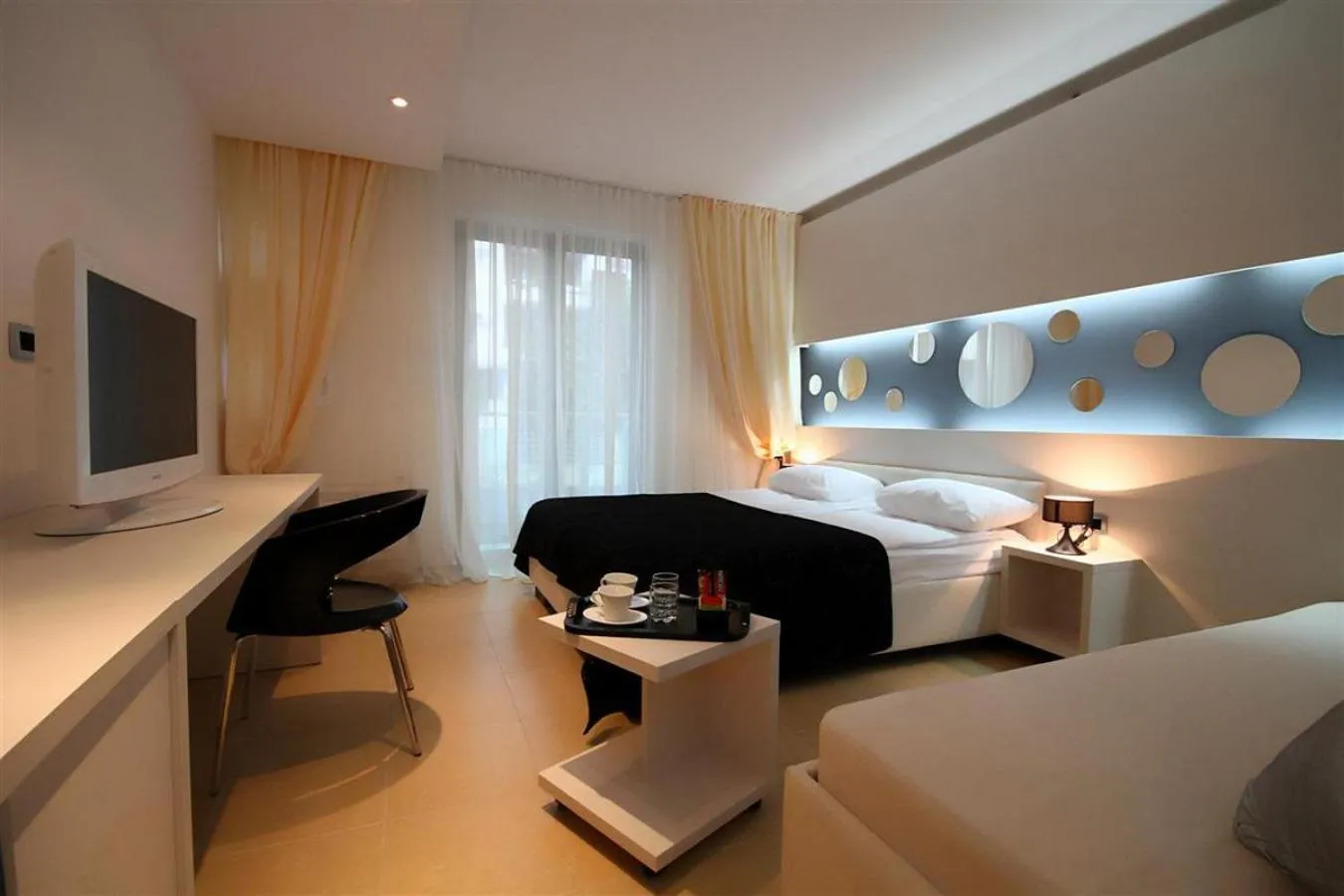 Bed in Domador Rooms & Apartments