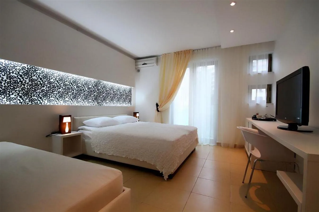 Bed in Domador Rooms & Apartments