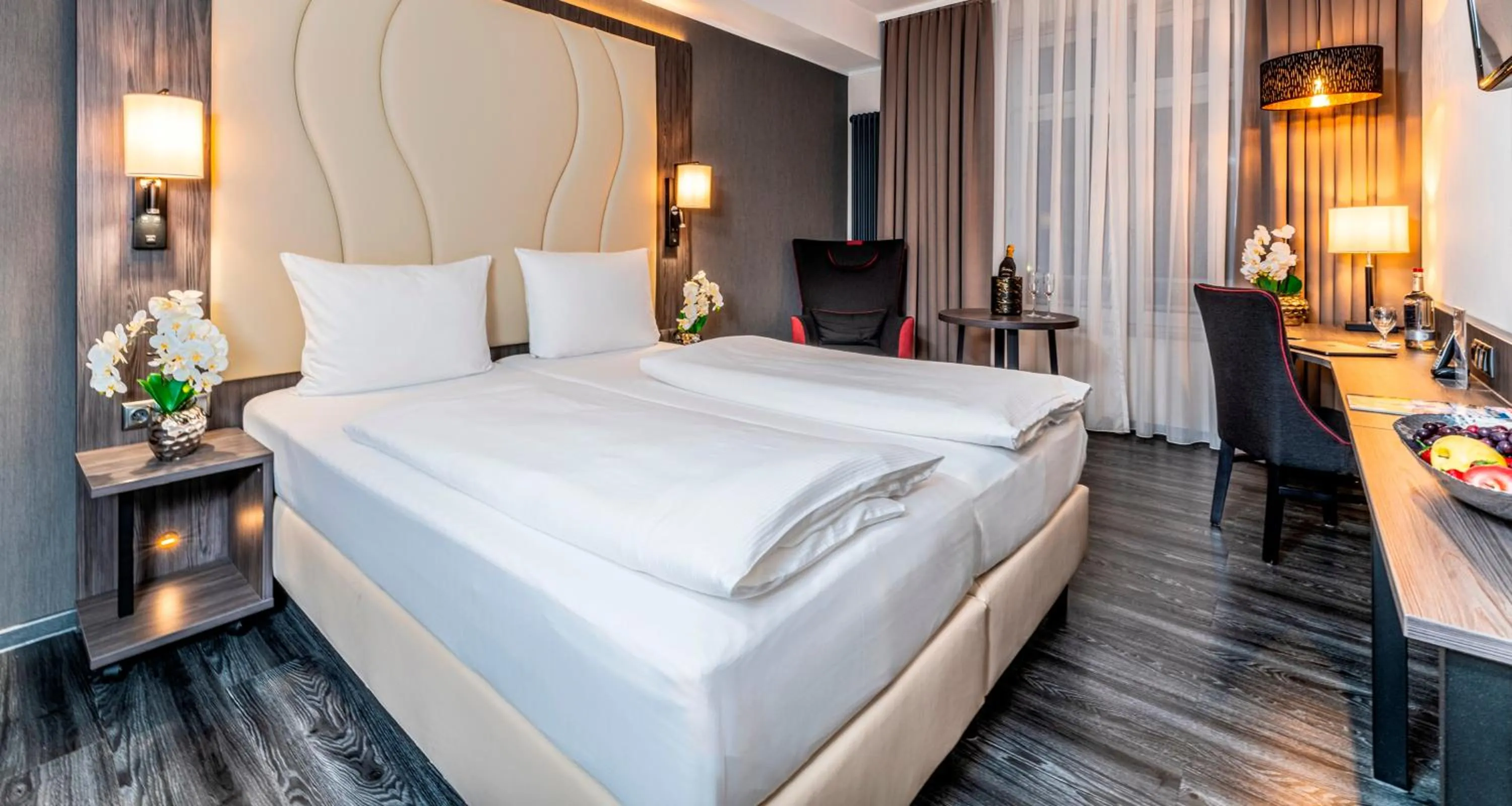 Bed in PLAZA Premium Parkhotel Norderstedt