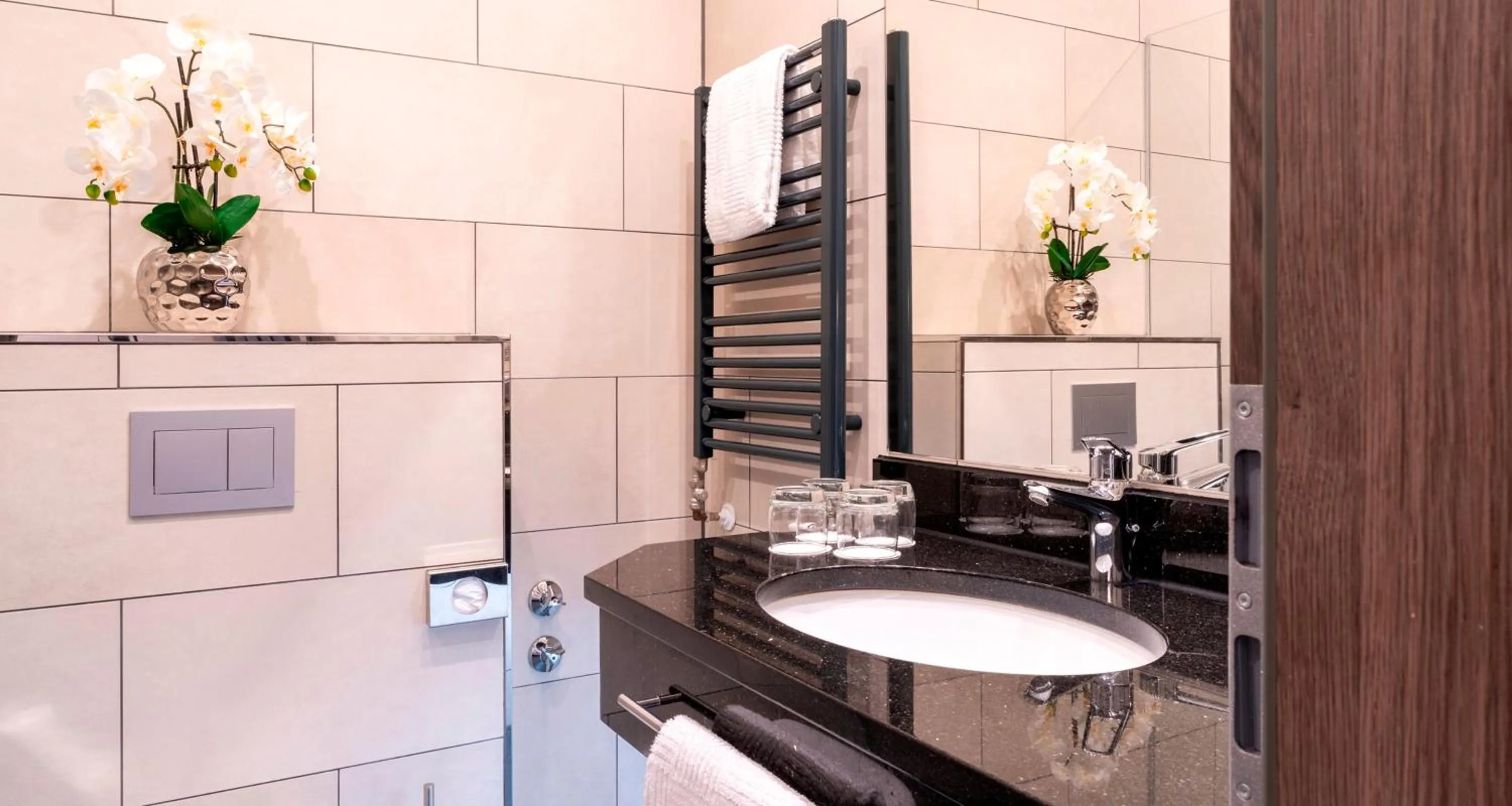 Bathroom in PLAZA Premium Parkhotel Norderstedt