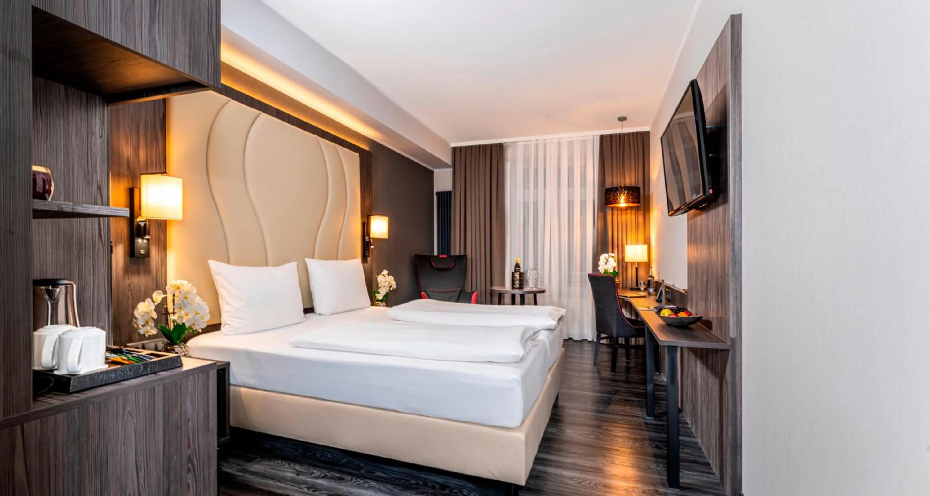 Bed in PLAZA Premium Parkhotel Norderstedt