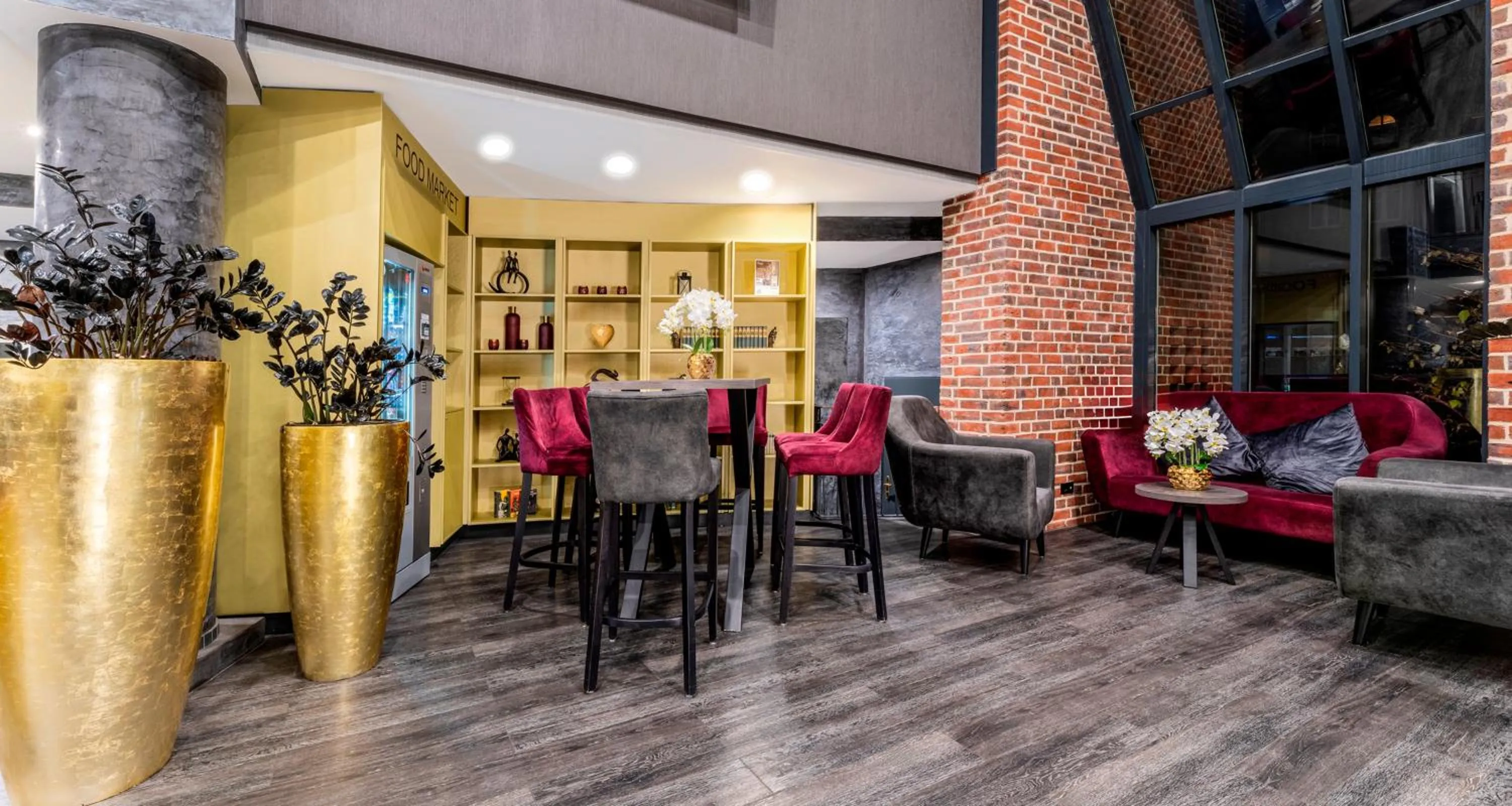 Lobby or reception in PLAZA Premium Parkhotel Norderstedt