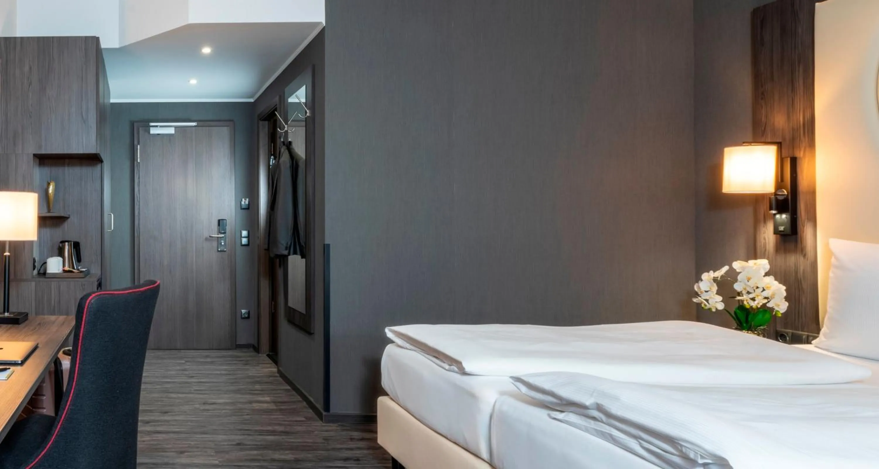 Photo of the whole room, Bed in PLAZA Premium Parkhotel Norderstedt