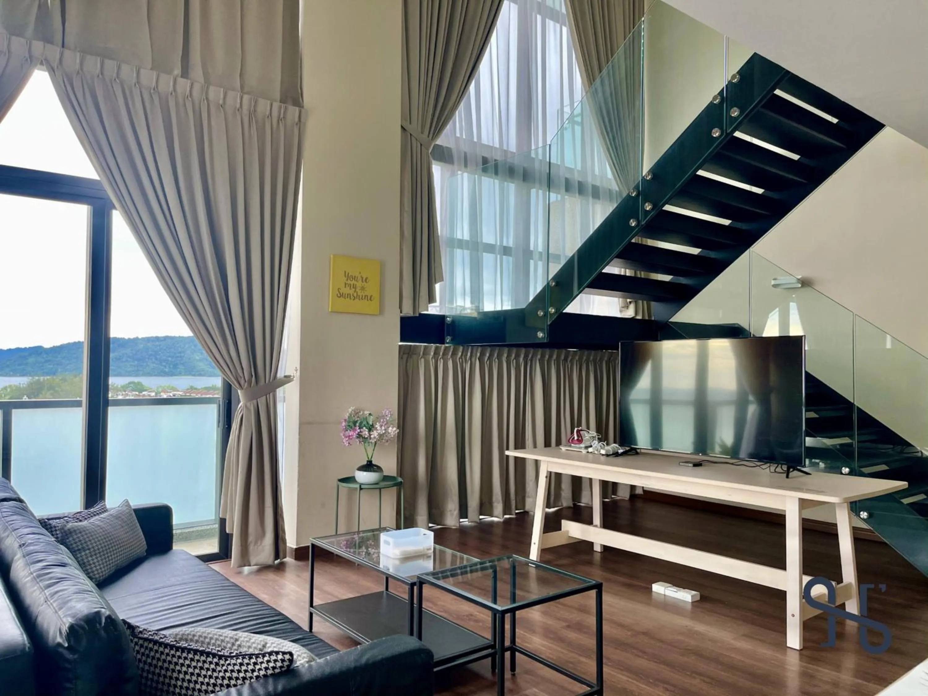 Living room in Homesuite' Home at Riverson Soho