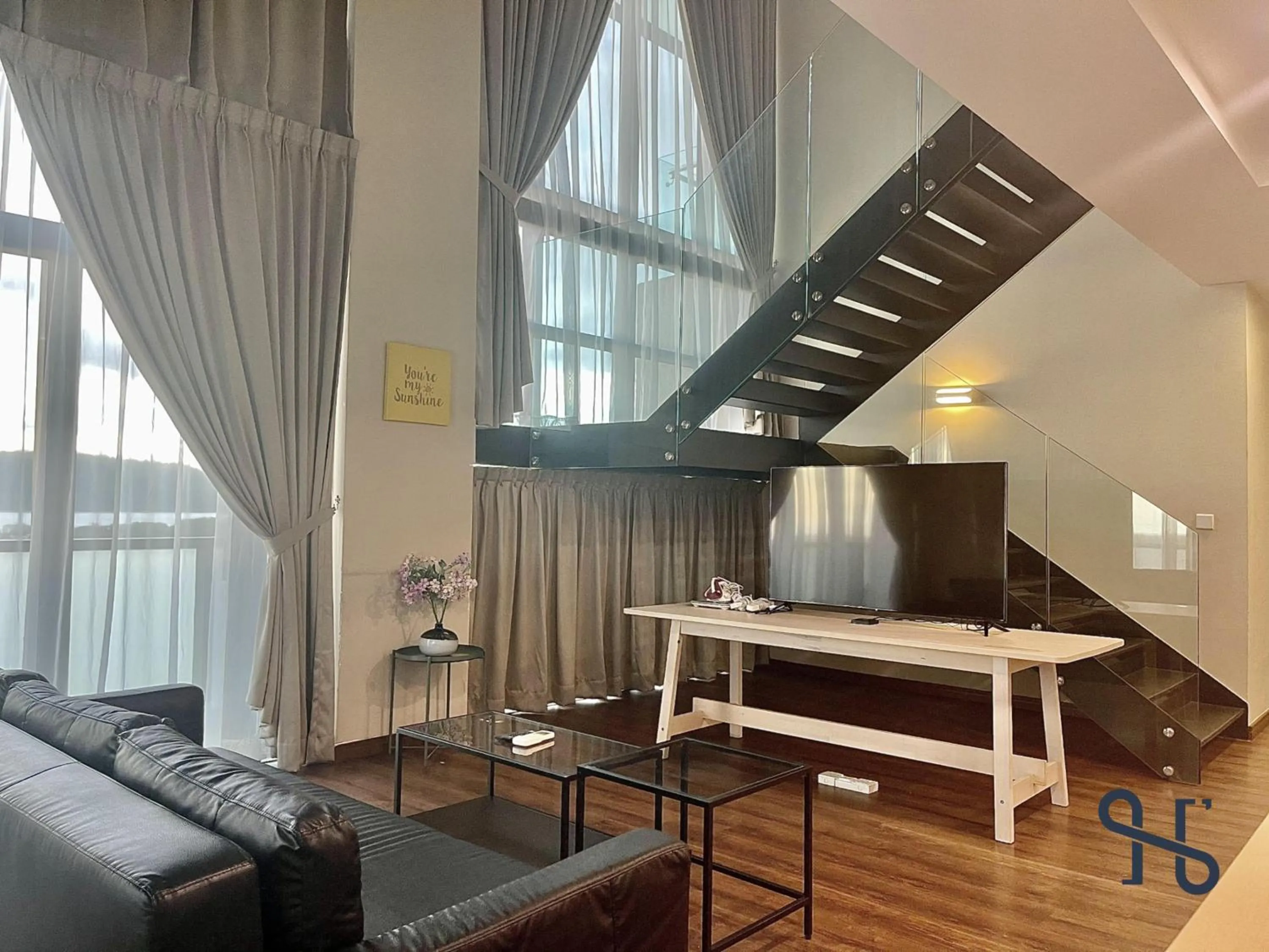 Living room in Homesuite' Home at Riverson Soho