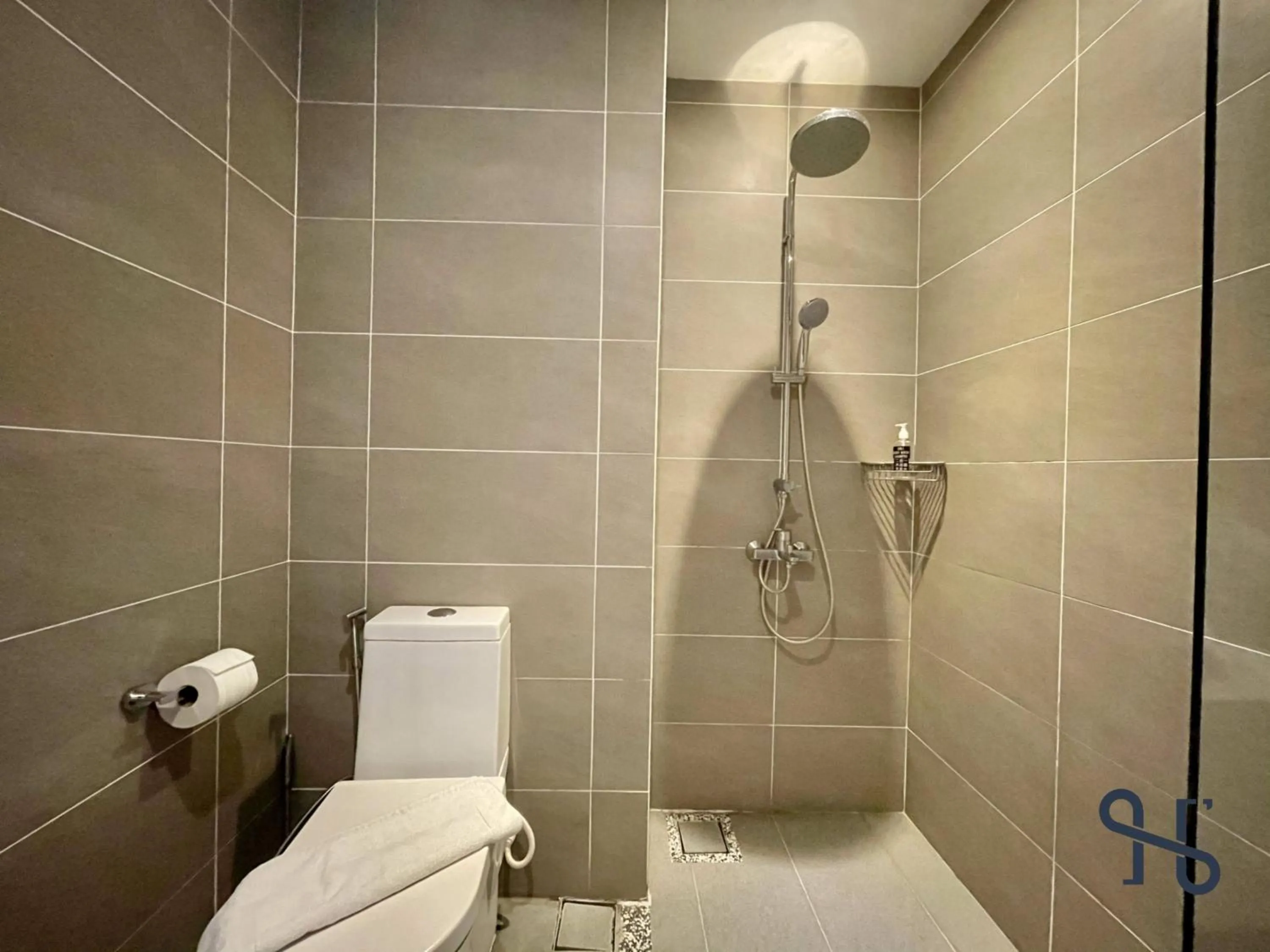 Bathroom in Homesuite' Home at Riverson Soho