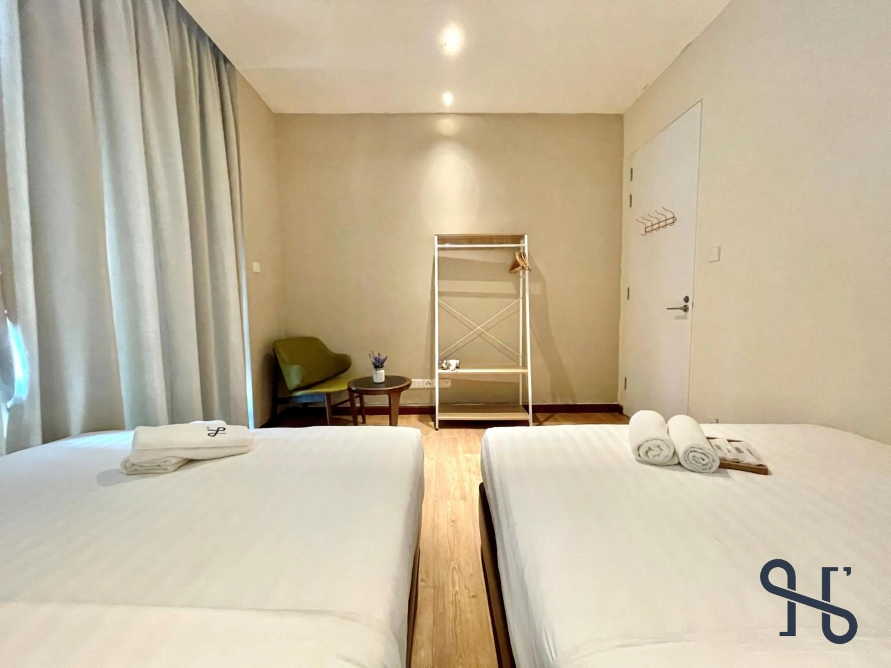 Bed in Homesuite' Home at Riverson Soho